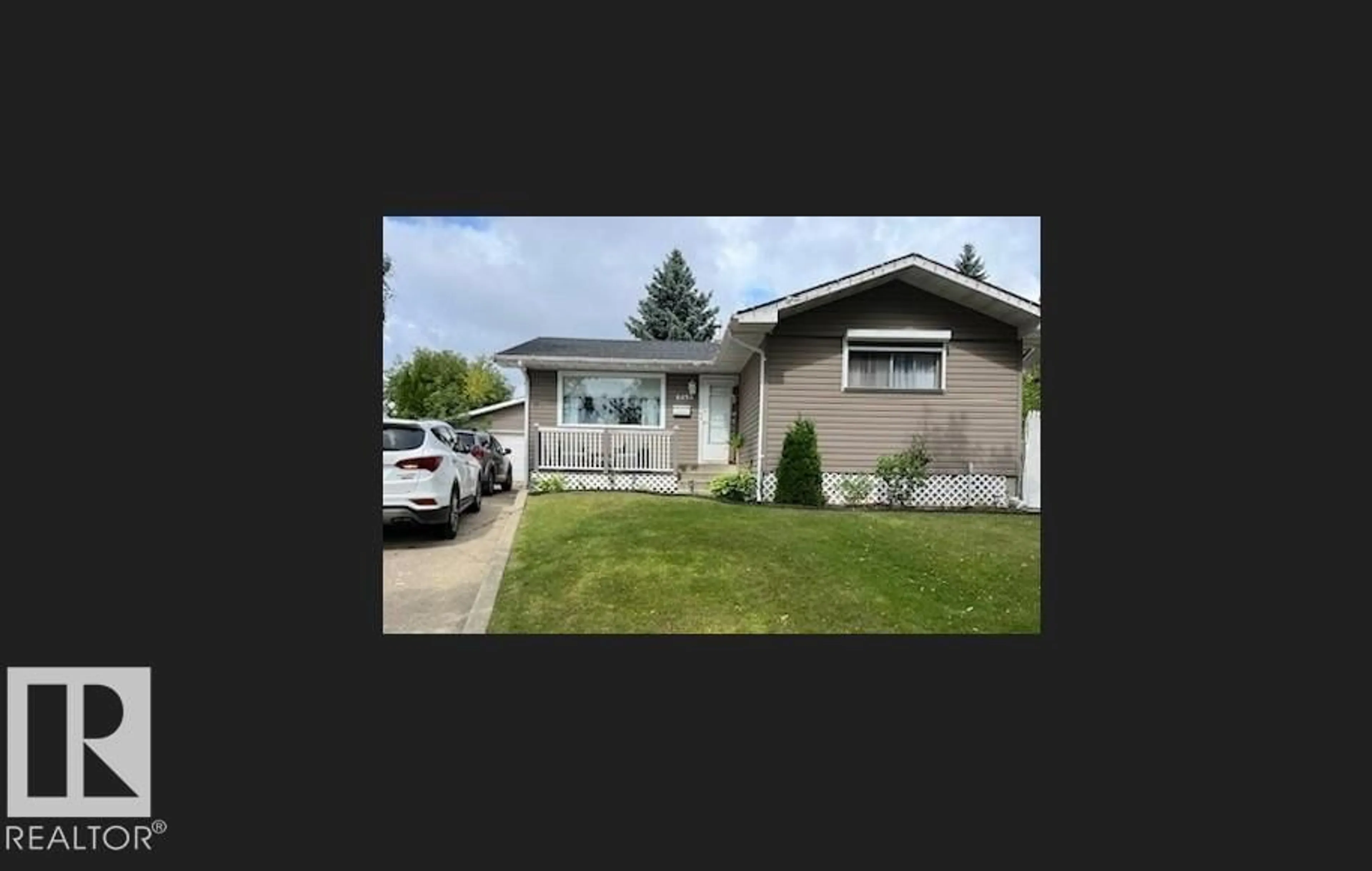 Home with vinyl exterior material, street for 6420 146 AV, Edmonton Alberta T5A1T3