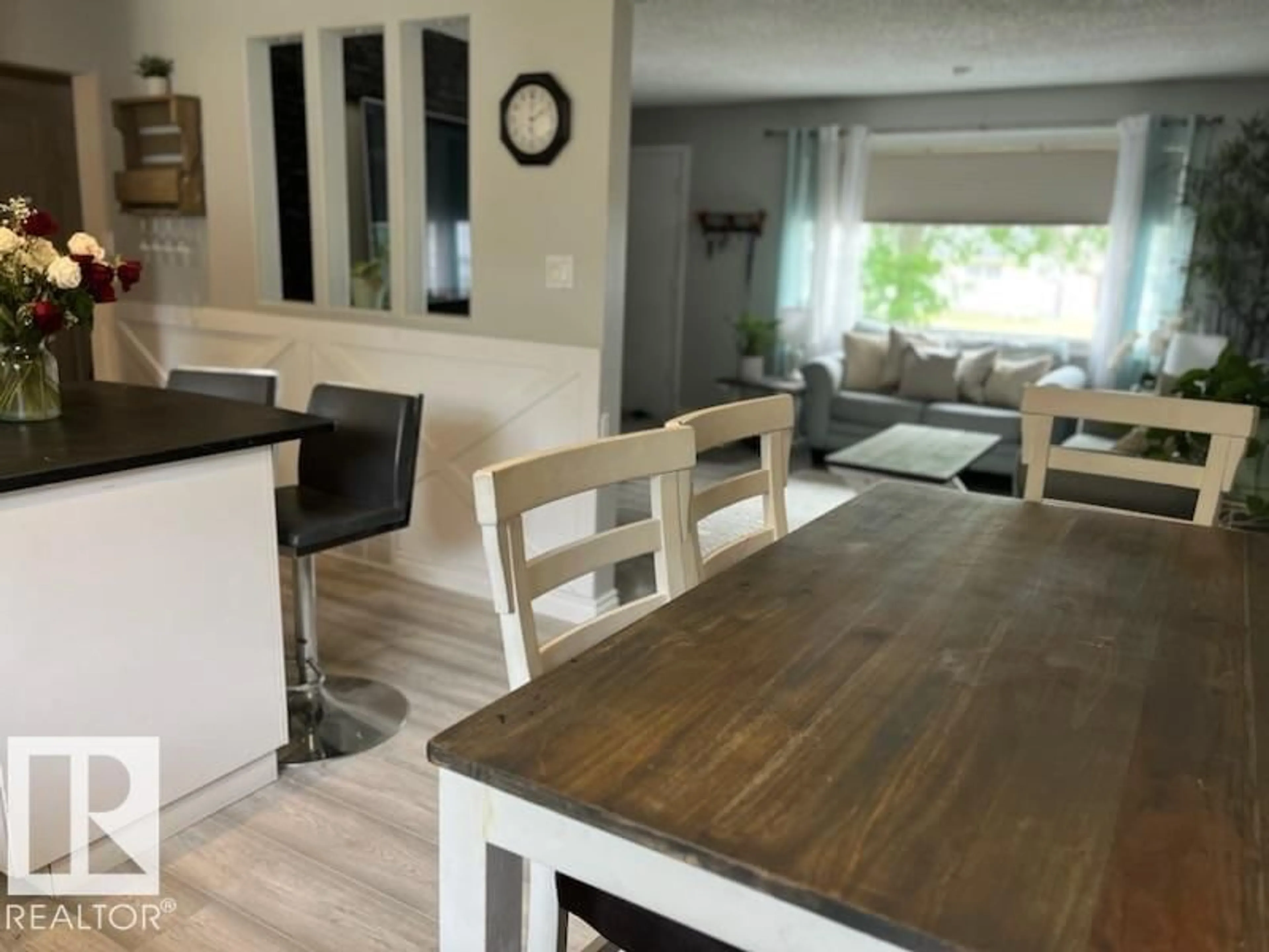 Open concept kitchen, wood/laminate floor for 6420 146 AV, Edmonton Alberta T5A1T3