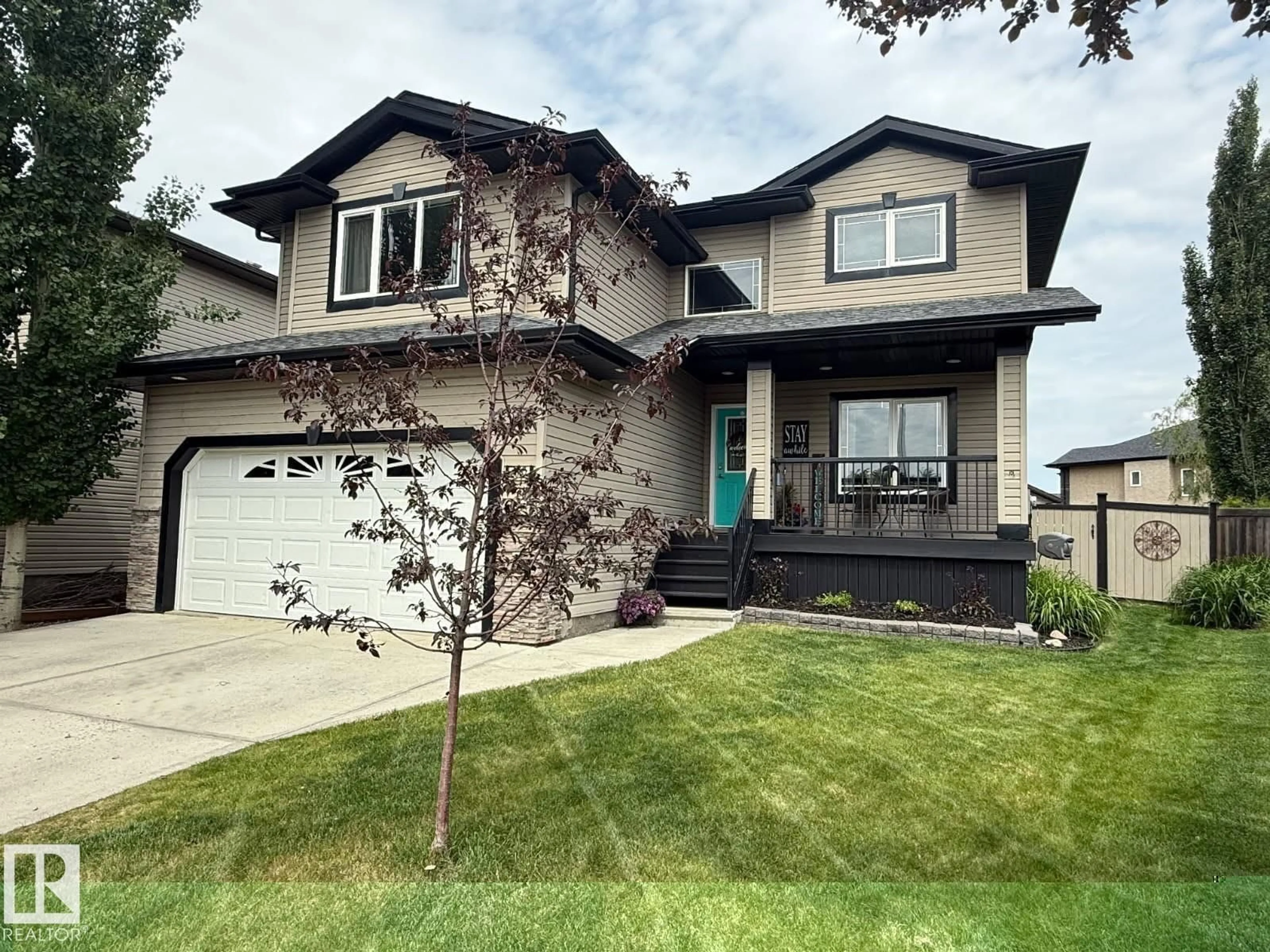 Home with vinyl exterior material, street for 6002 55 AV, Beaumont Alberta T4X0B3