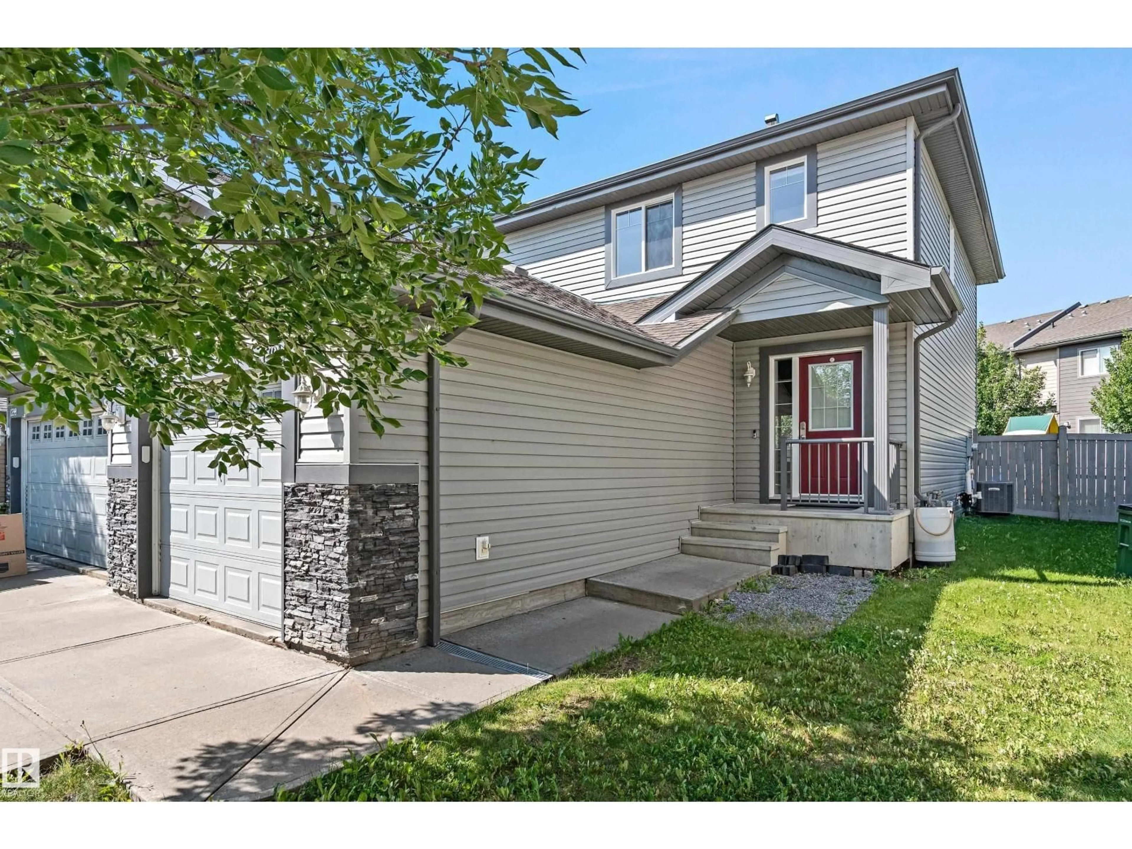 Home with vinyl exterior material, street for 1301 CUNNINGHAM DR, Edmonton Alberta T6W0R7