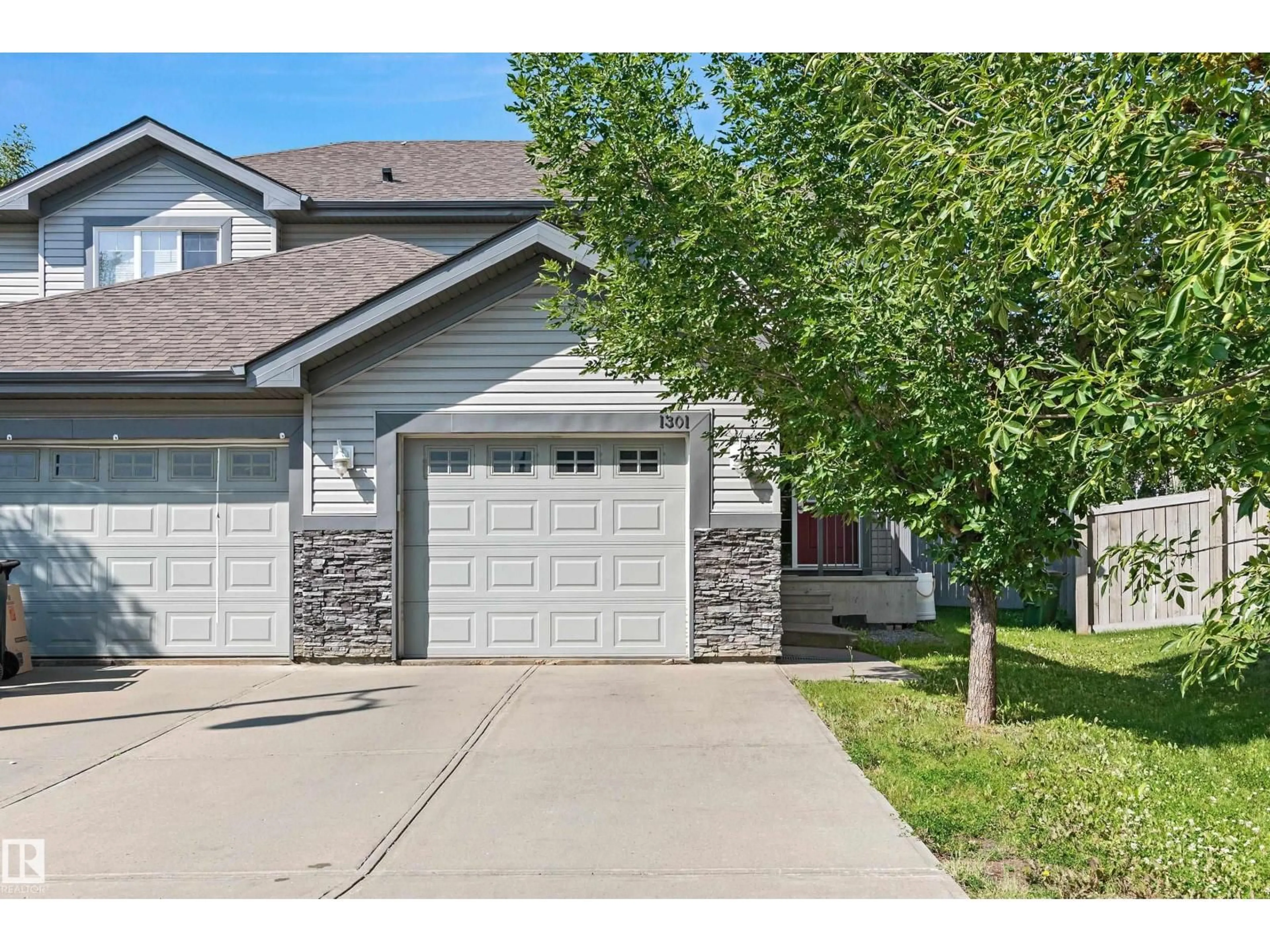 Home with vinyl exterior material, street for 1301 CUNNINGHAM DR, Edmonton Alberta T6W0R7