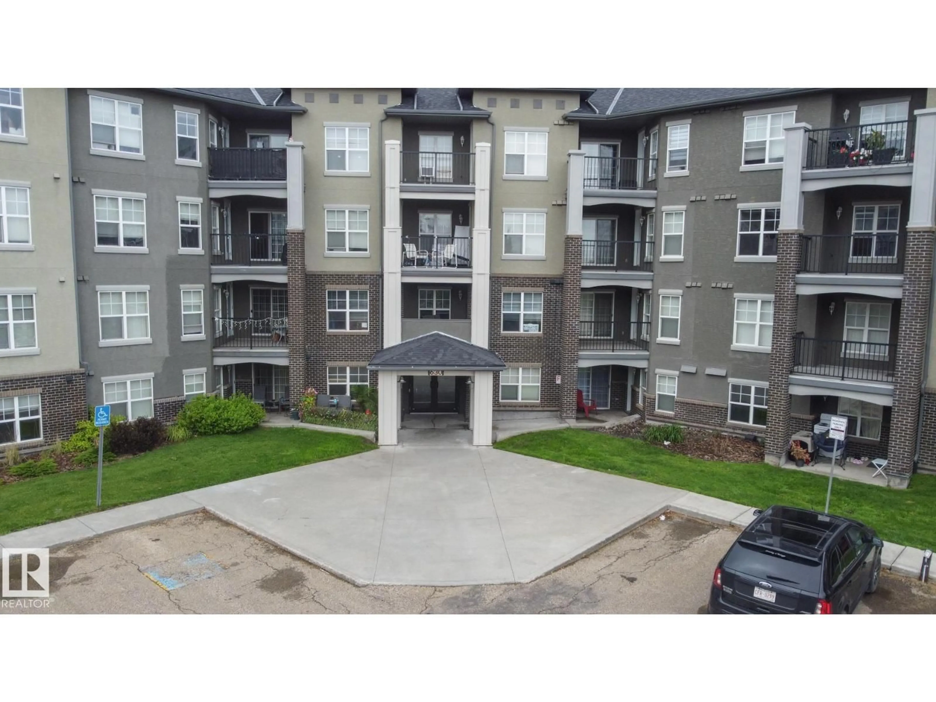 A pic from outside/outdoor area/front of a property/back of a property/a pic from drone, unknown for #113 - 630 MCALLISTER LO, Edmonton Alberta T6W1N1