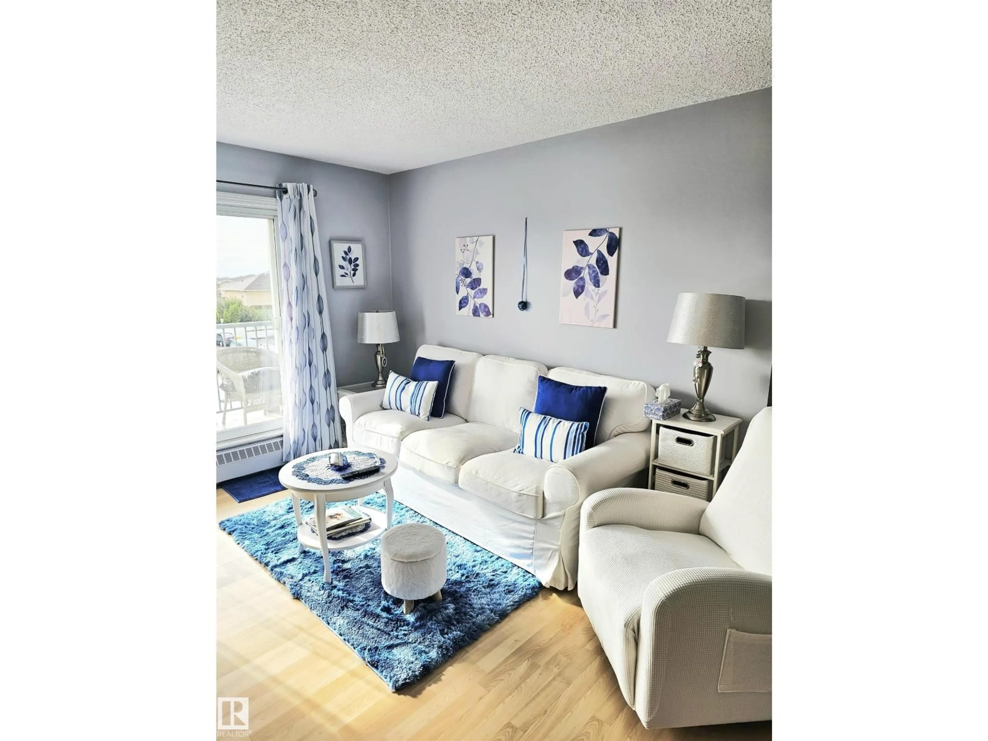Living room with furniture, unknown for #318 - 6710 158 AV, Edmonton Alberta T5Z3A7