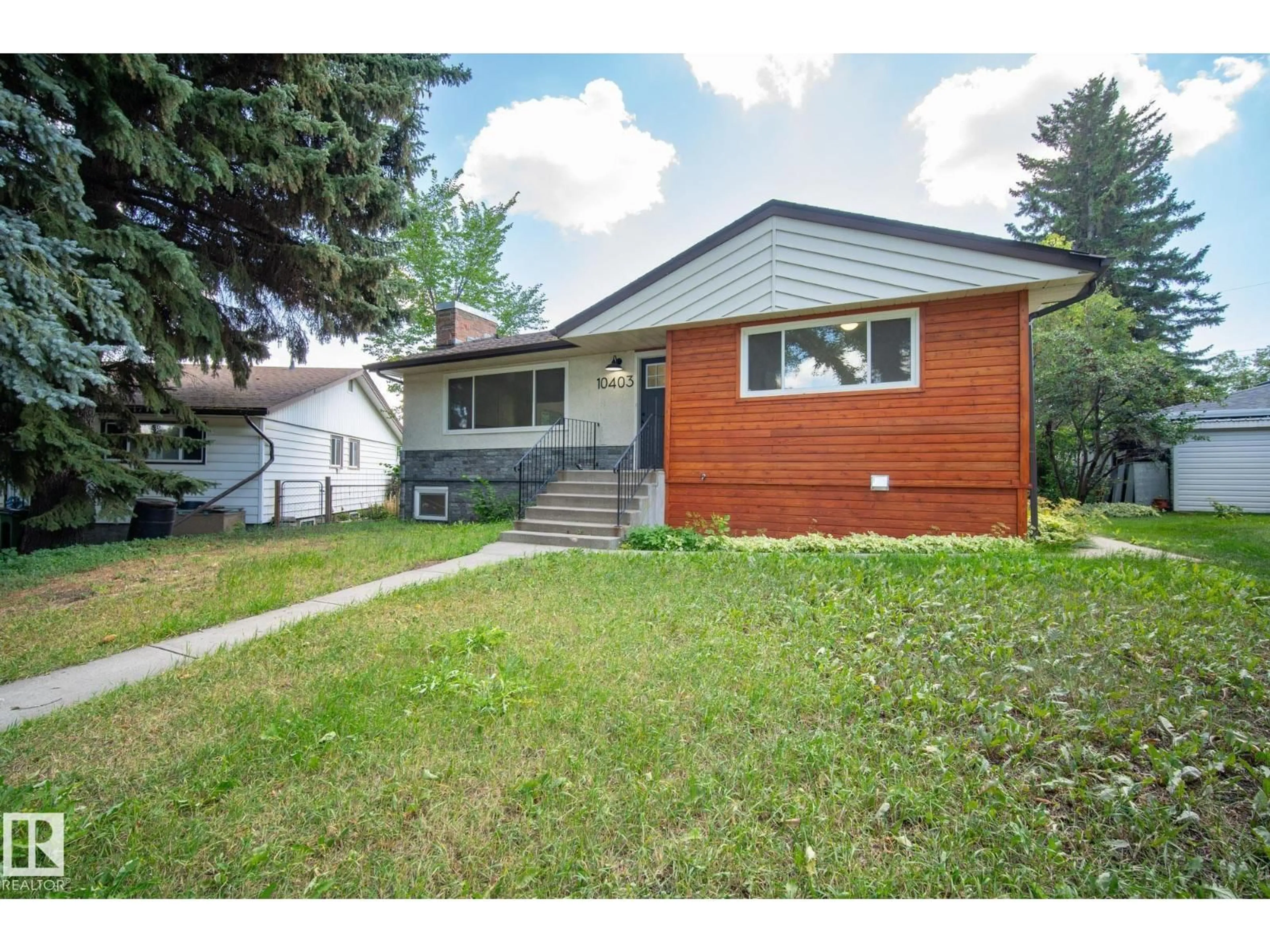 Home with vinyl exterior material, street for NW - 10403 65 AV, Edmonton Alberta T6H1V2