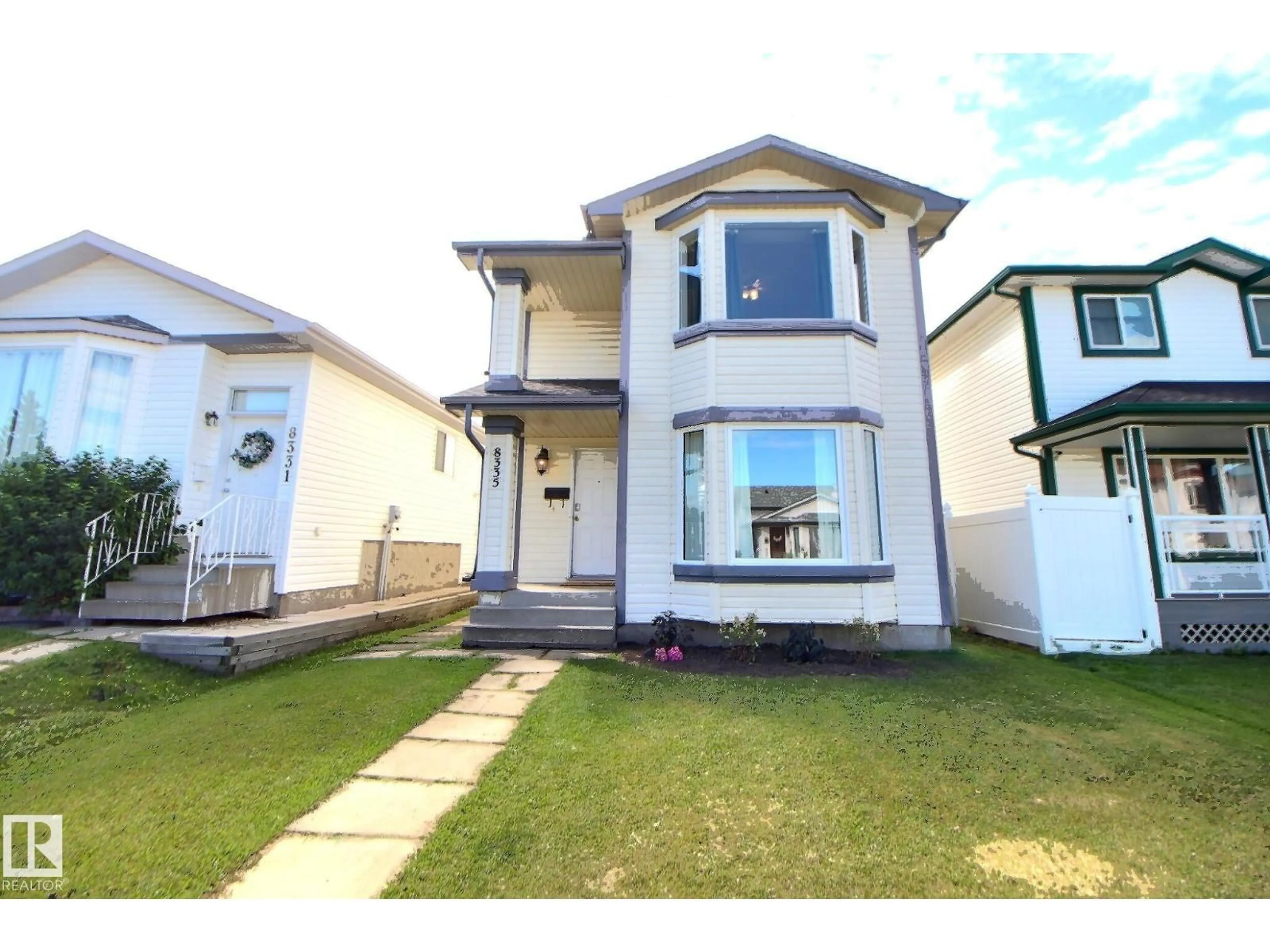A pic from outside/outdoor area/front of a property/back of a property/a pic from drone, street for 8335 159 AV, Edmonton Alberta T5Z3C8