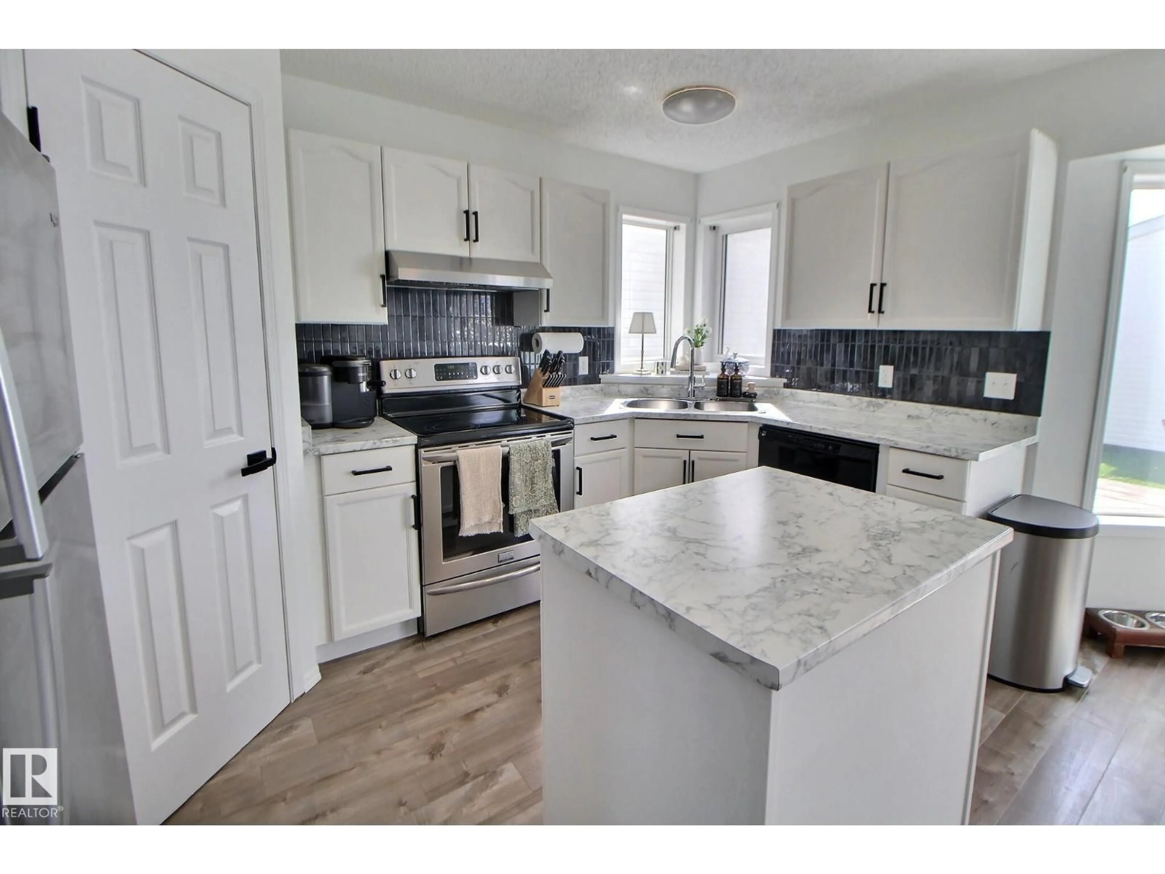 Open concept kitchen, unknown for 8335 159 AV, Edmonton Alberta T5Z3C8