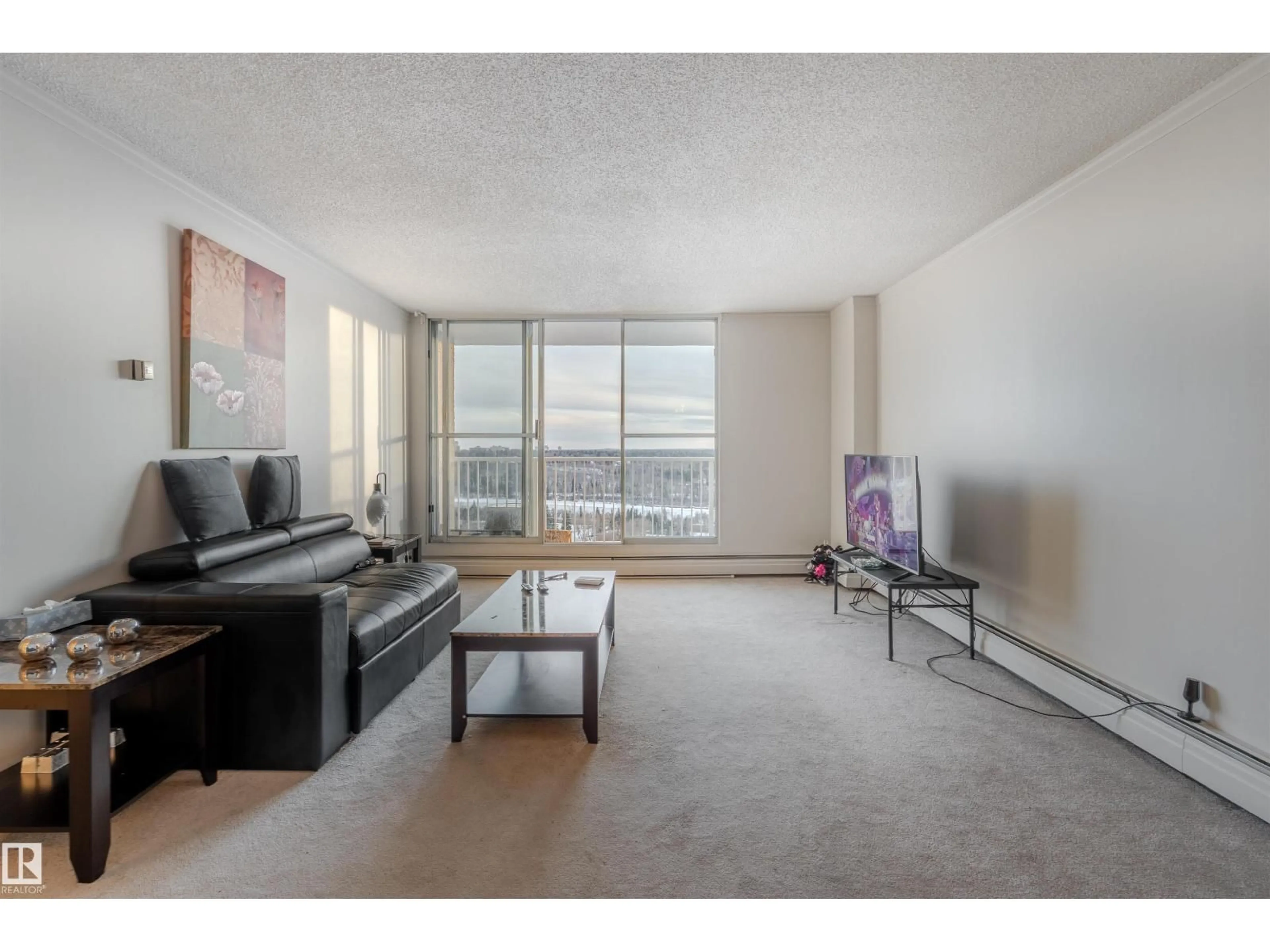 Living room with furniture, unknown for #1007 - 12121 JASPER AV, Edmonton Alberta T5N3X7