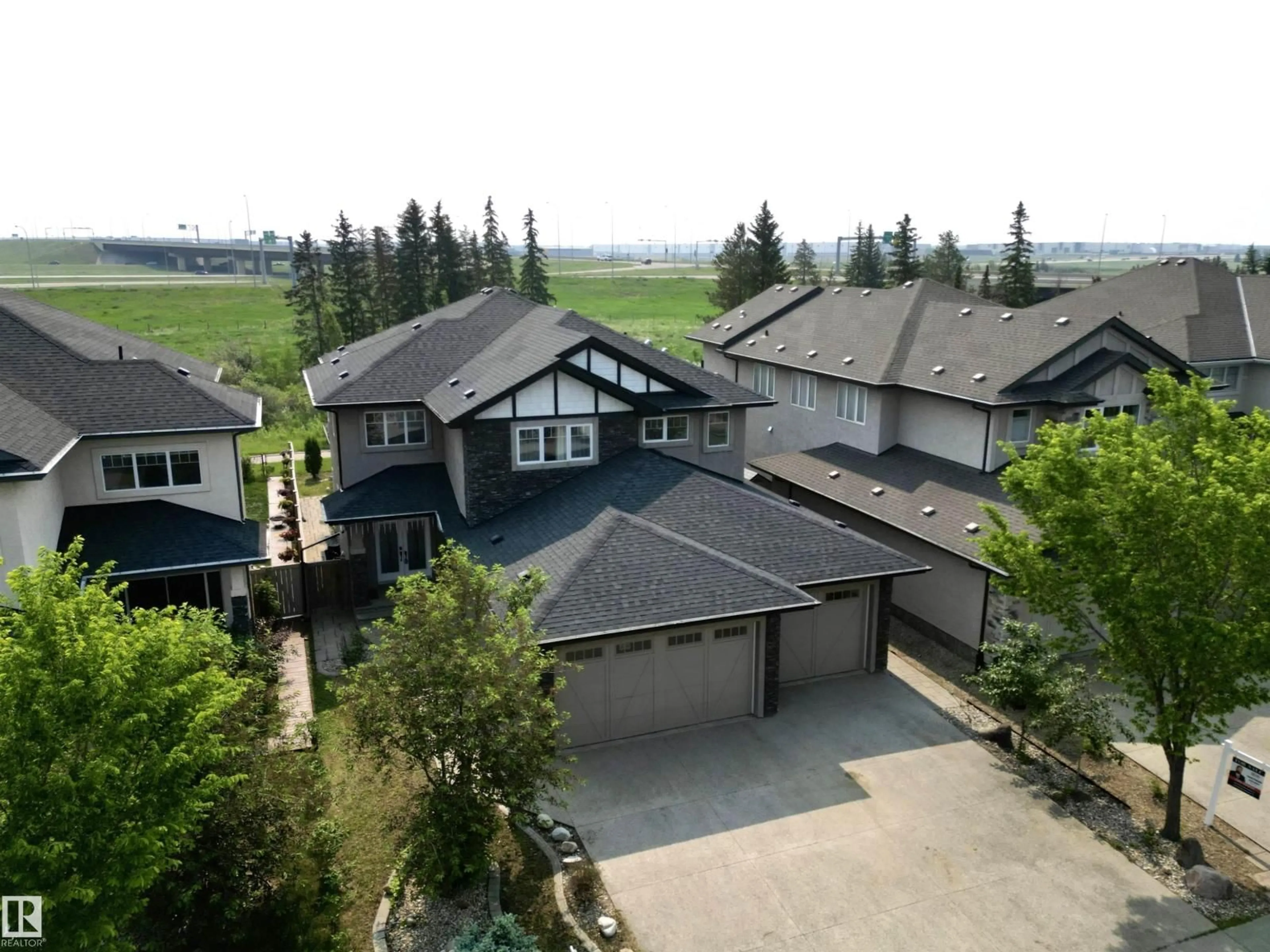 A pic from outside/outdoor area/front of a property/back of a property/a pic from drone, unknown for 1328 ADAMSON DR, Edmonton Alberta T6W1A8