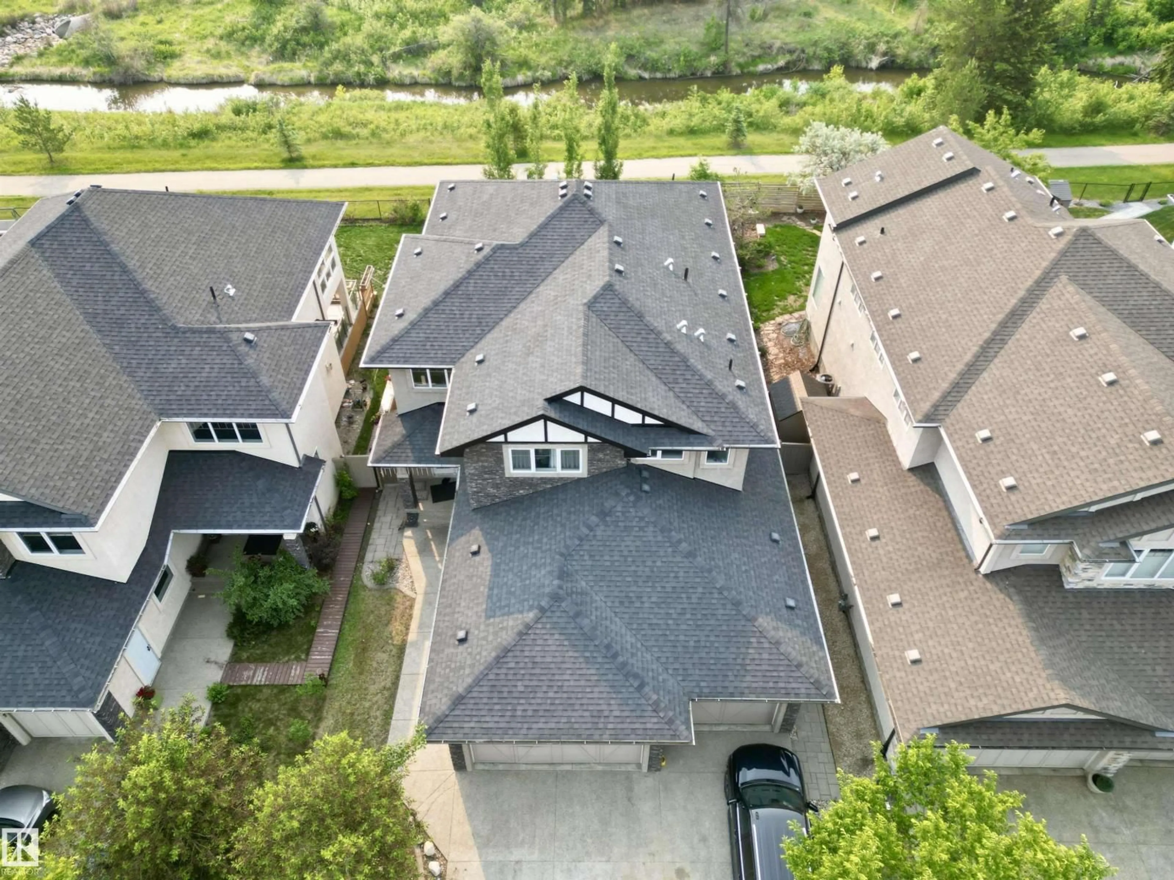 A pic from outside/outdoor area/front of a property/back of a property/a pic from drone, street for 1328 ADAMSON DR, Edmonton Alberta T6W1A8