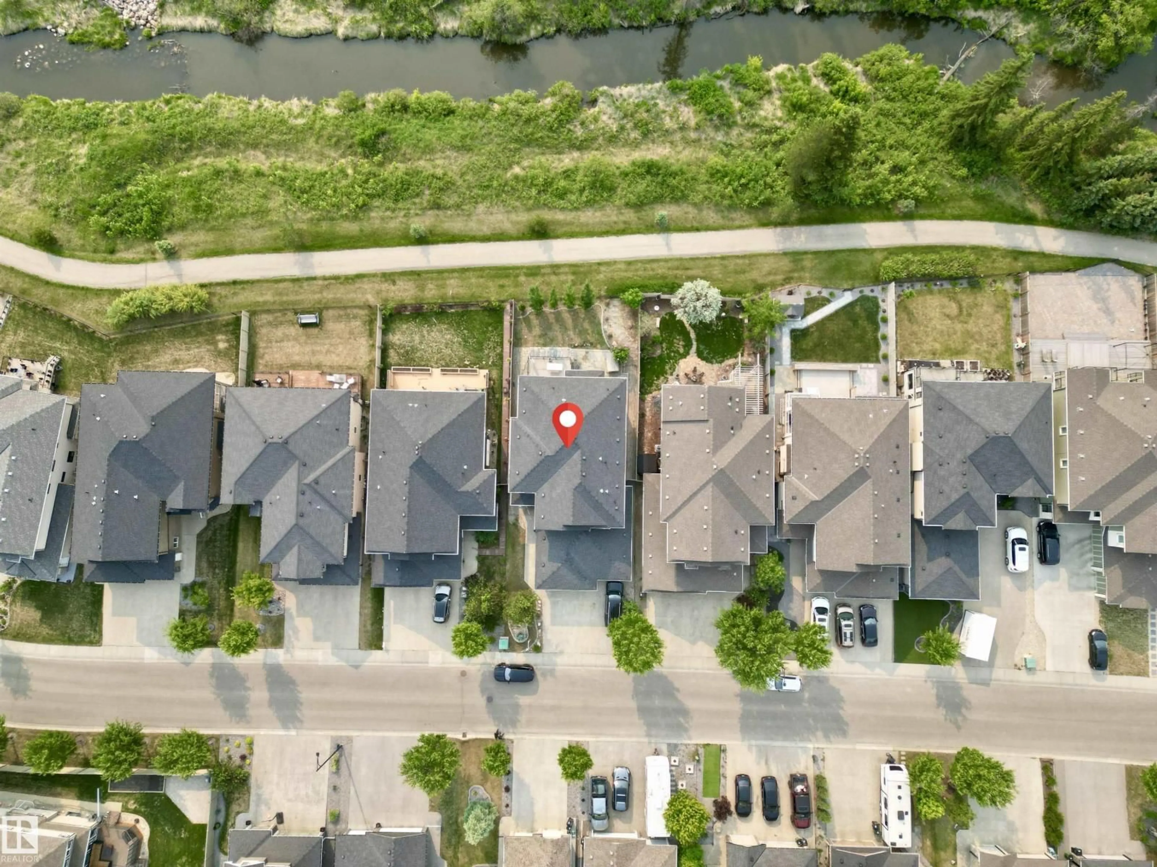 A pic from outside/outdoor area/front of a property/back of a property/a pic from drone, street for 1328 ADAMSON DR, Edmonton Alberta T6W1A8