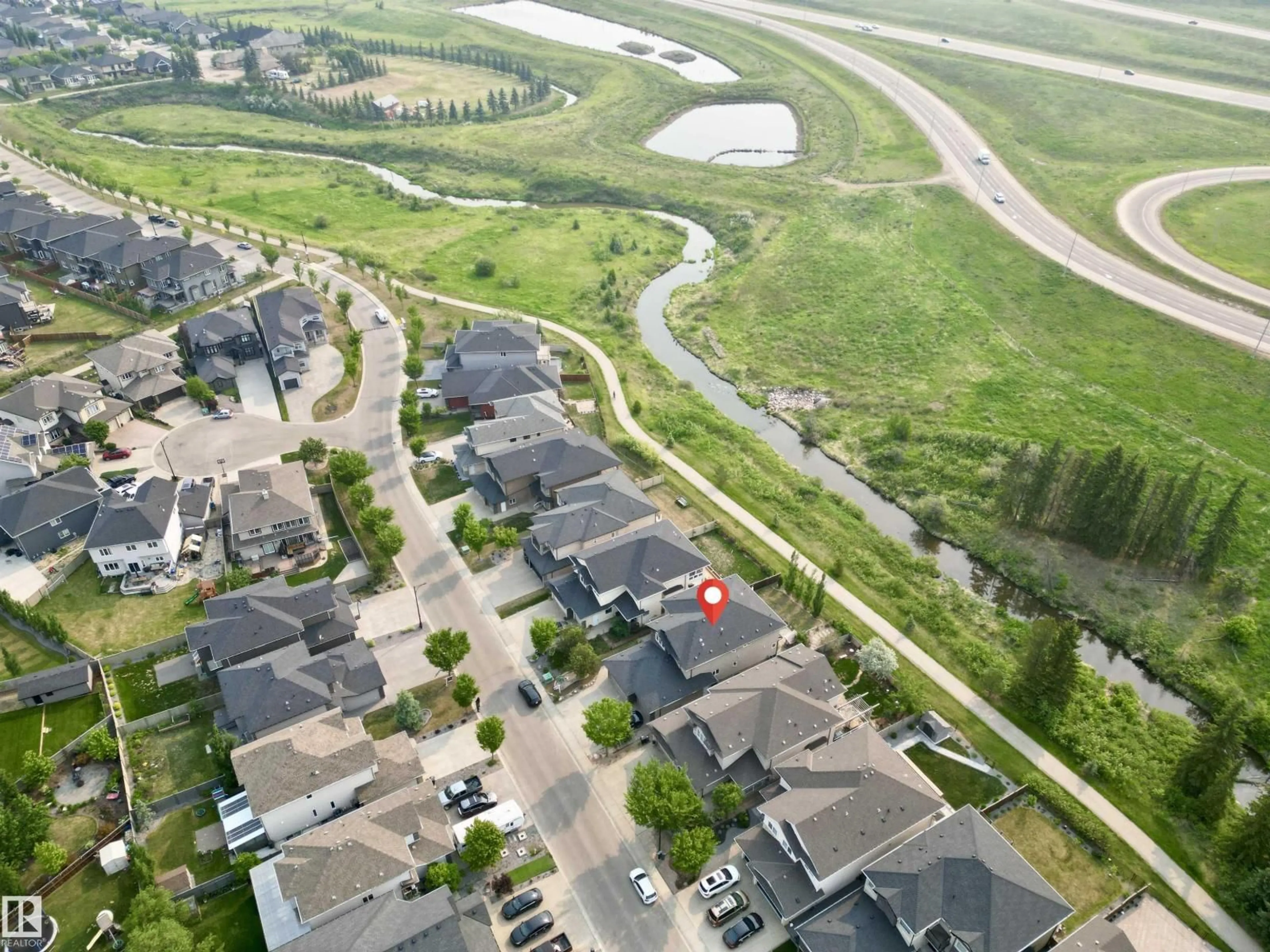 A pic from outside/outdoor area/front of a property/back of a property/a pic from drone, street for 1328 ADAMSON DR, Edmonton Alberta T6W1A8