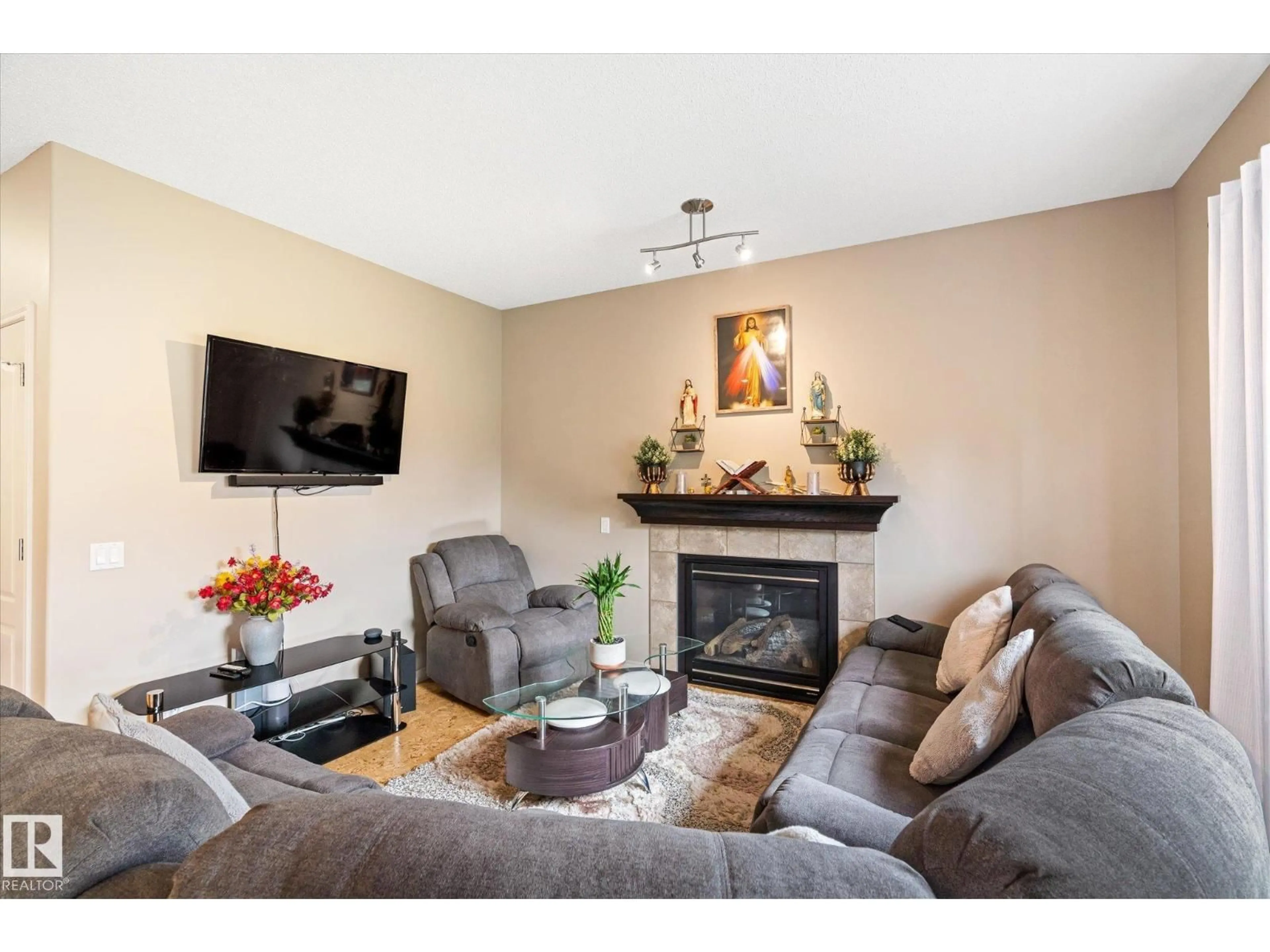 Living room with furniture, wood/laminate floor for 34 NORELLE TERRACE, St. Albert Alberta T8N3V5