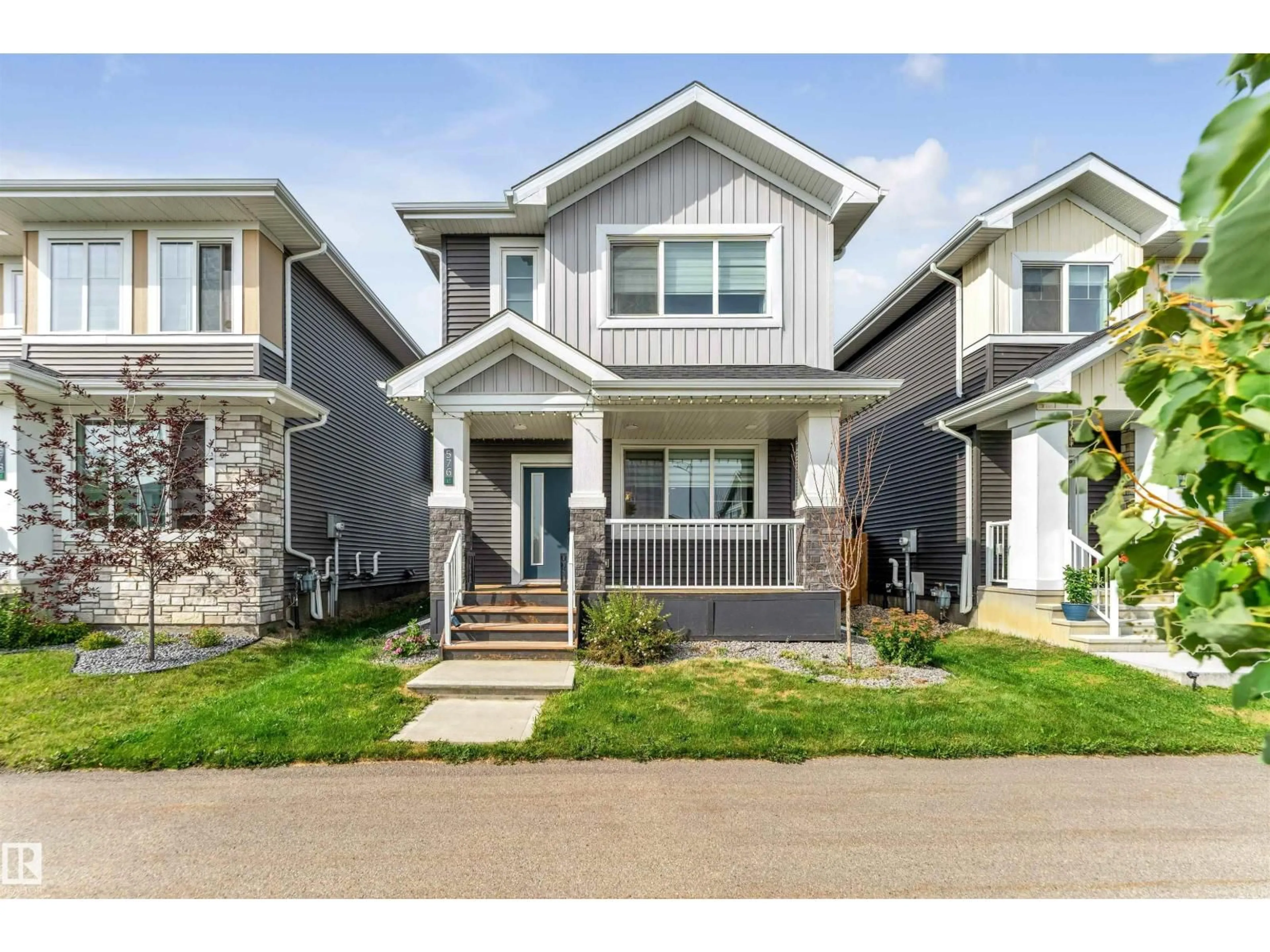 Home with vinyl exterior material, street for 576 GLENRIDDING RAVINE DR, Edmonton Alberta T6W4P1