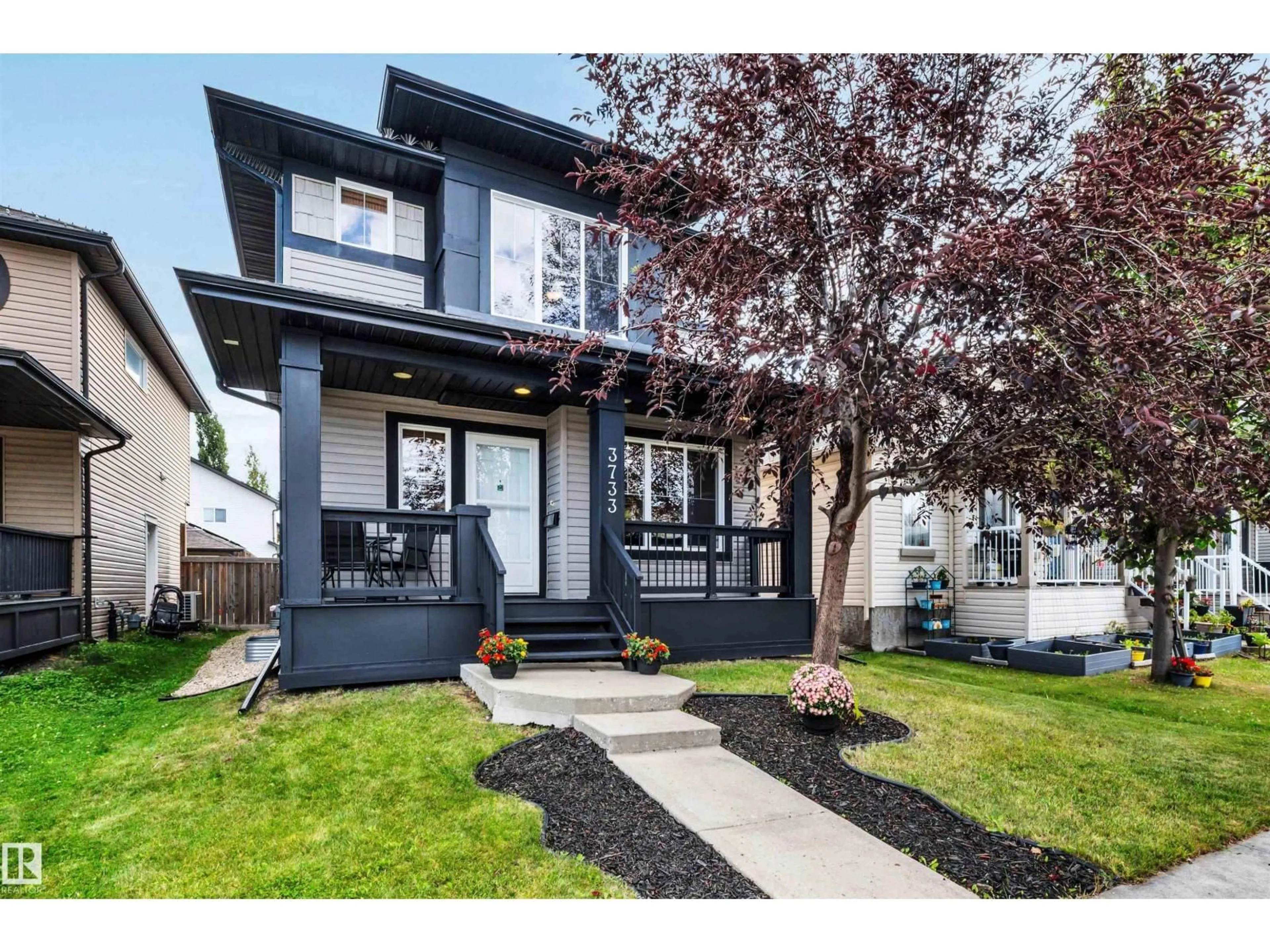 Home with vinyl exterior material, street for 3733 12 ST, Edmonton Alberta T6T0E6