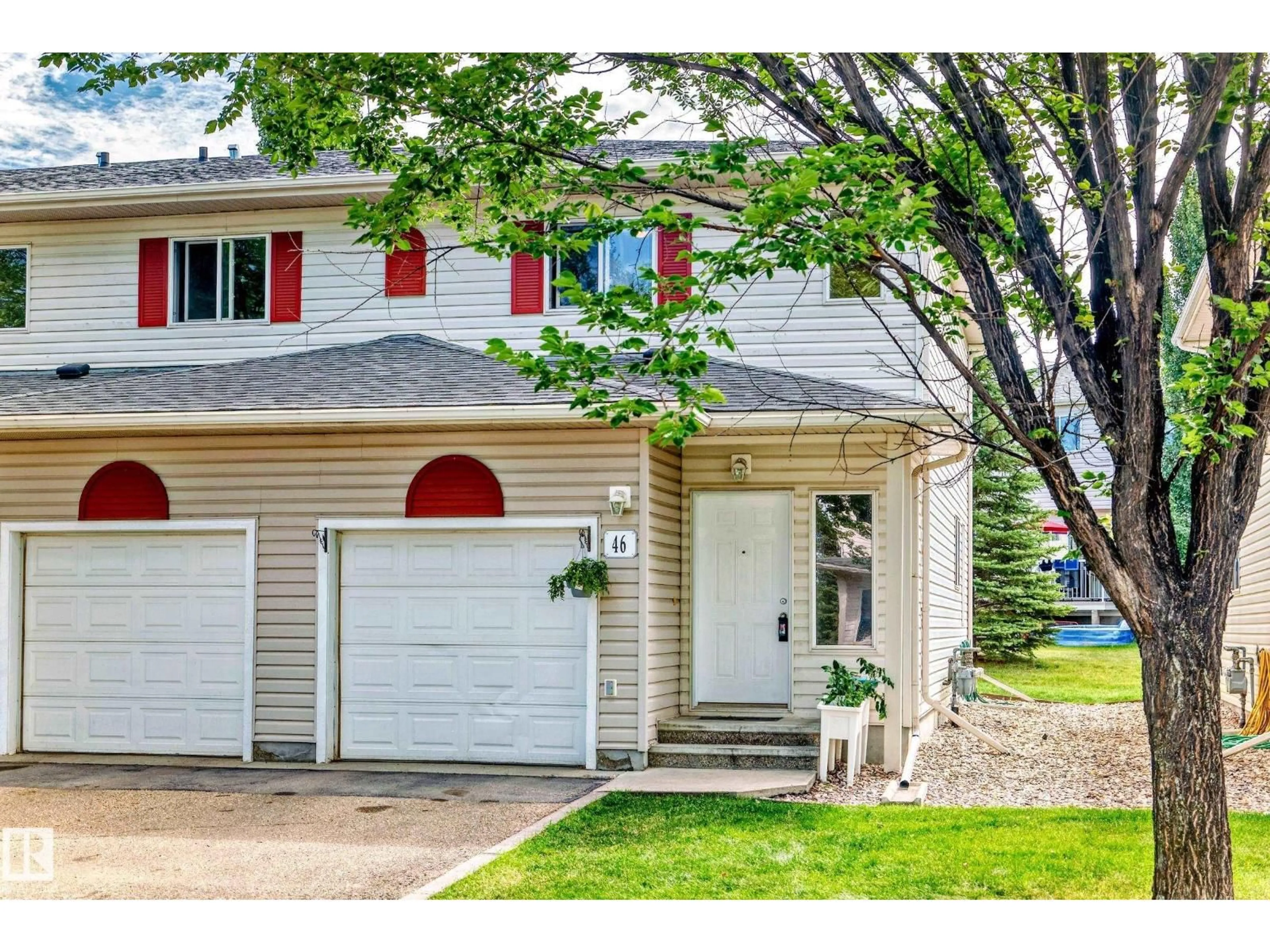 Home with vinyl exterior material, street for 451 - 46 HYNDMAN CRESCENT, Edmonton Alberta T5A5J3