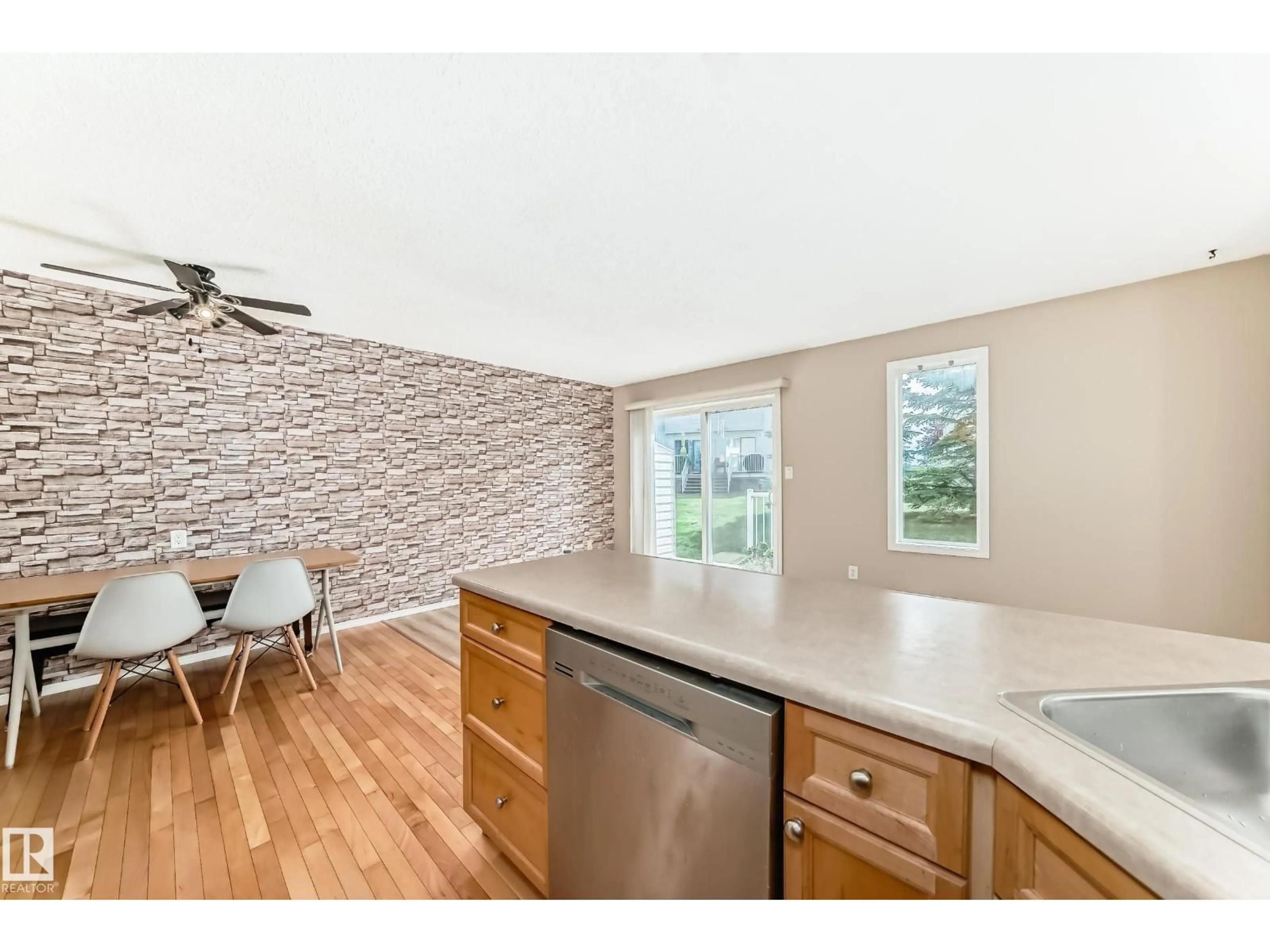 Open concept kitchen, ceramic/tile floor for 451 - 46 HYNDMAN CRESCENT, Edmonton Alberta T5A5J3