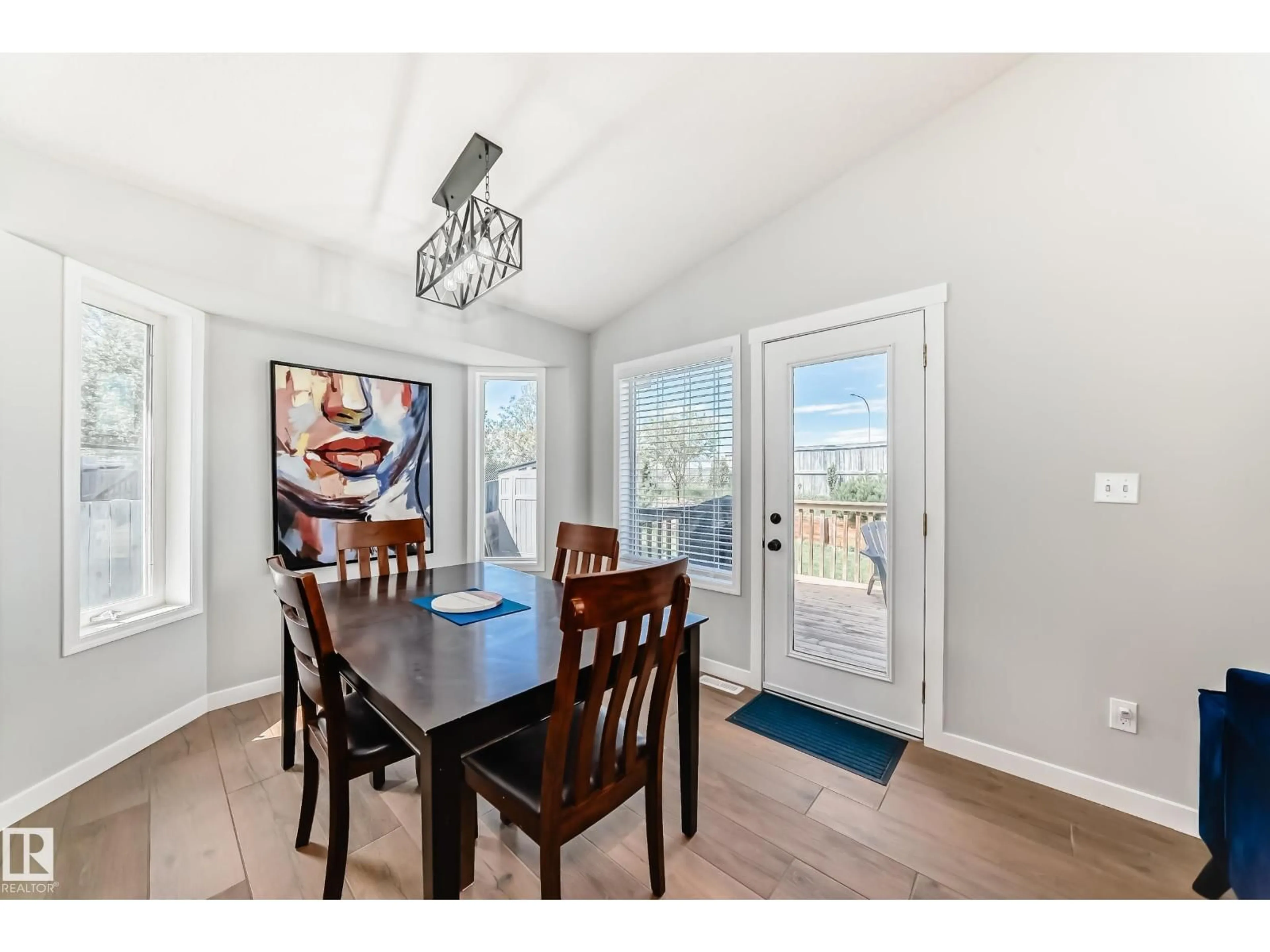 Dining room, wood/laminate floor for 66 CATALINA DR, Sherwood Park Alberta T8H2B4