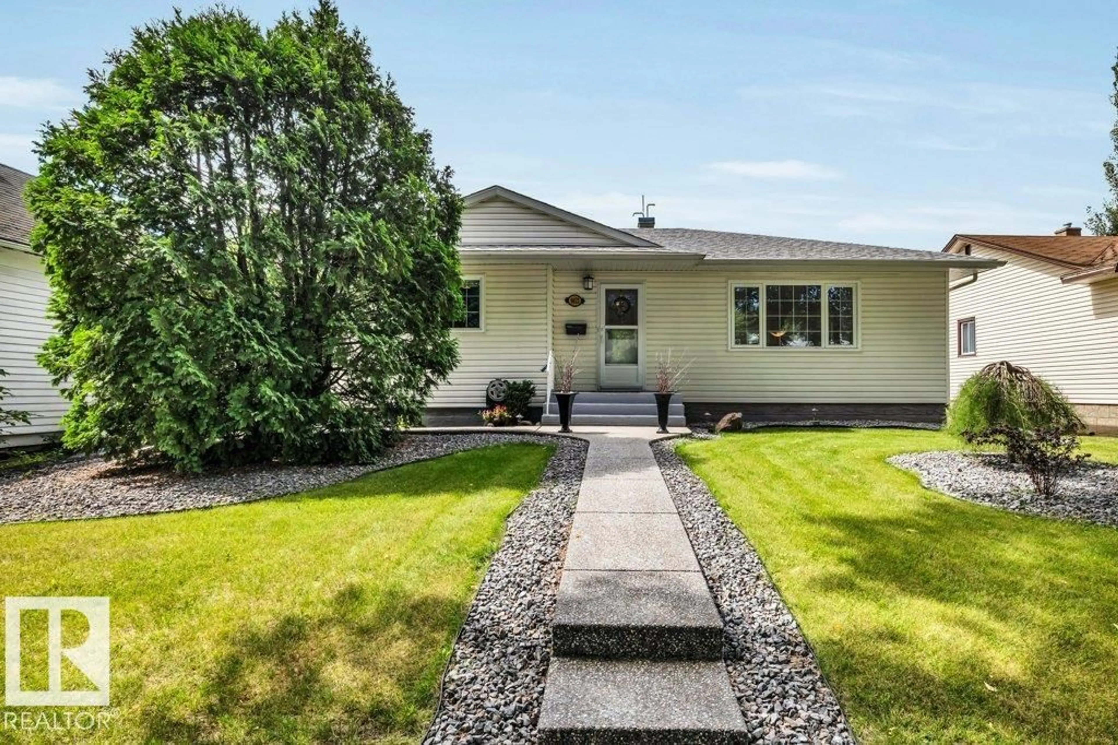 Home with vinyl exterior material, street for NW - 9622 79 ST, Edmonton Alberta T6C2R9