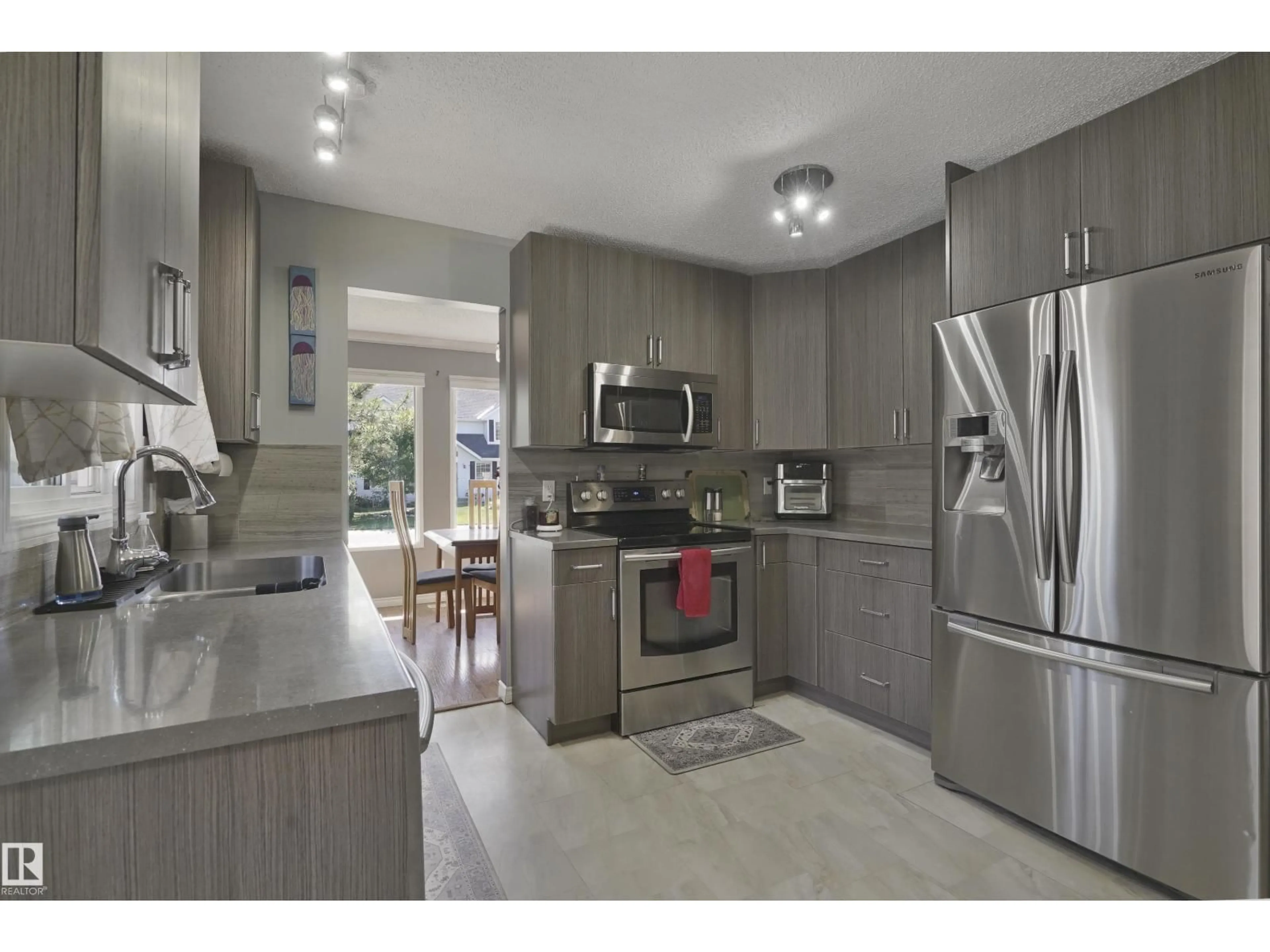 Open concept kitchen, unknown for 18522 99A AV, Edmonton Alberta T5T3P5