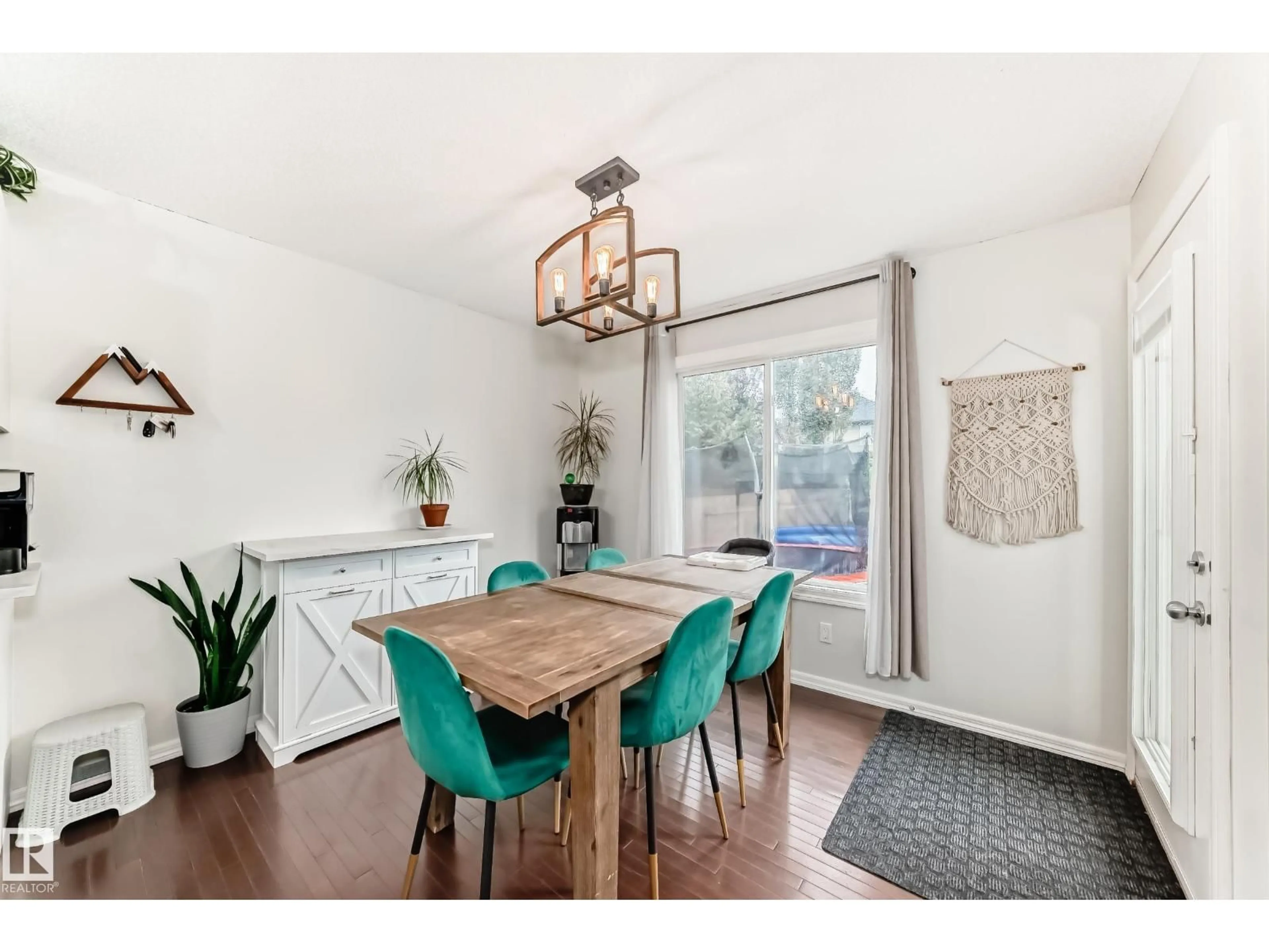 Dining room, wood/laminate floor for 106 RUE MONIQUE, Beaumont Alberta T4X0G3