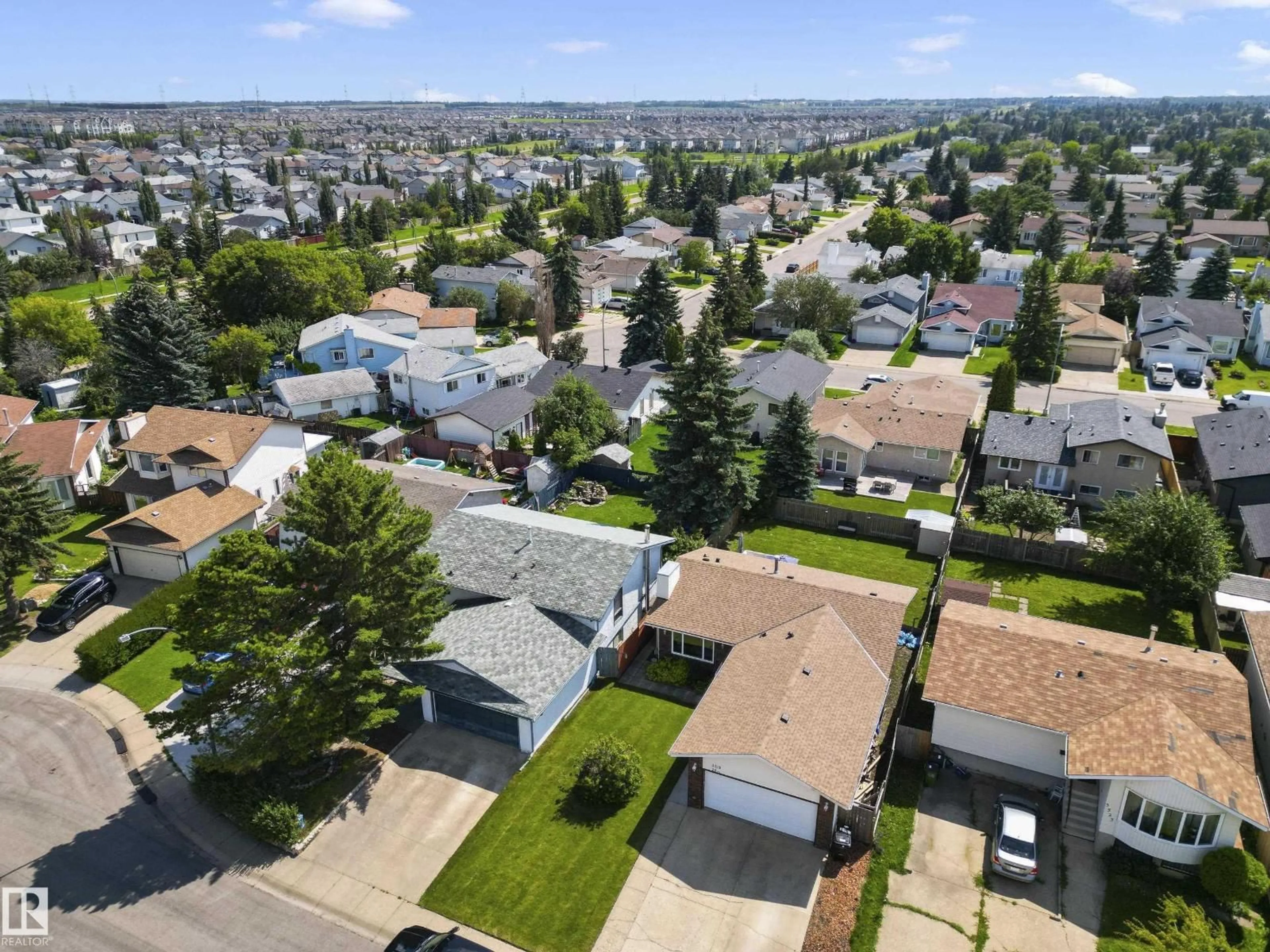 A pic from outside/outdoor area/front of a property/back of a property/a pic from drone, street for 3519 28 AV, Edmonton Alberta T6L3Y5