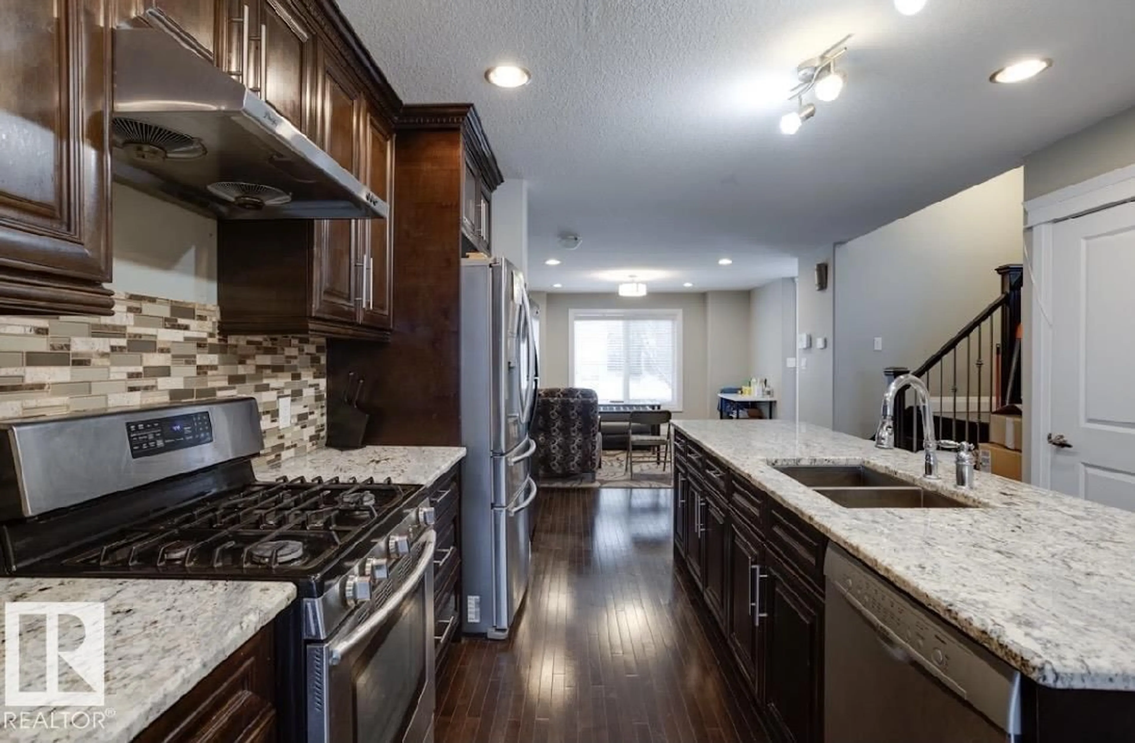 Open concept kitchen, ceramic/tile floor for 10935 76 AV, Edmonton Alberta T6G0J6