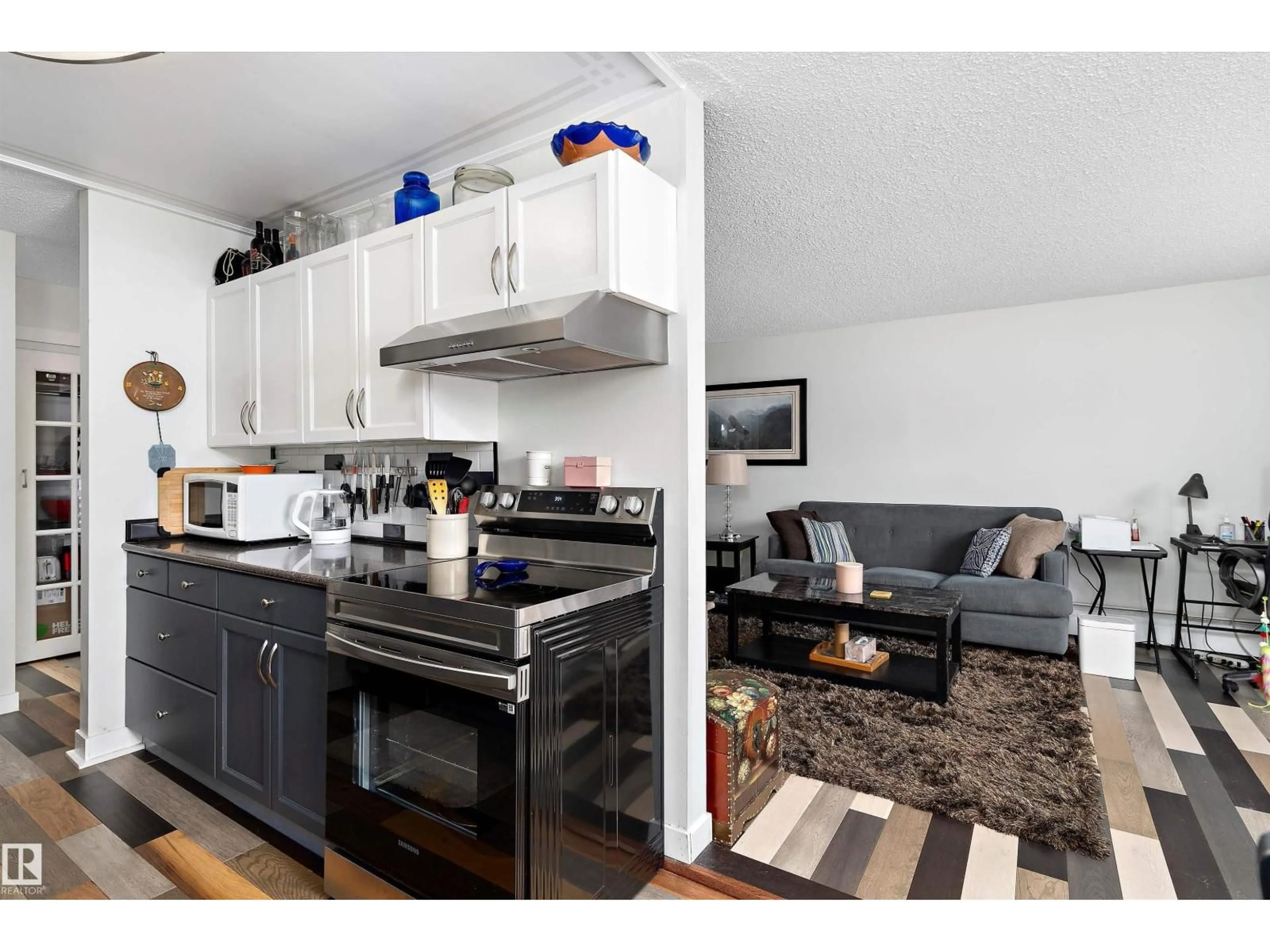 Open concept kitchen, wood/laminate floor for #3 - 13450 FORT RD, Edmonton Alberta T5A1C5