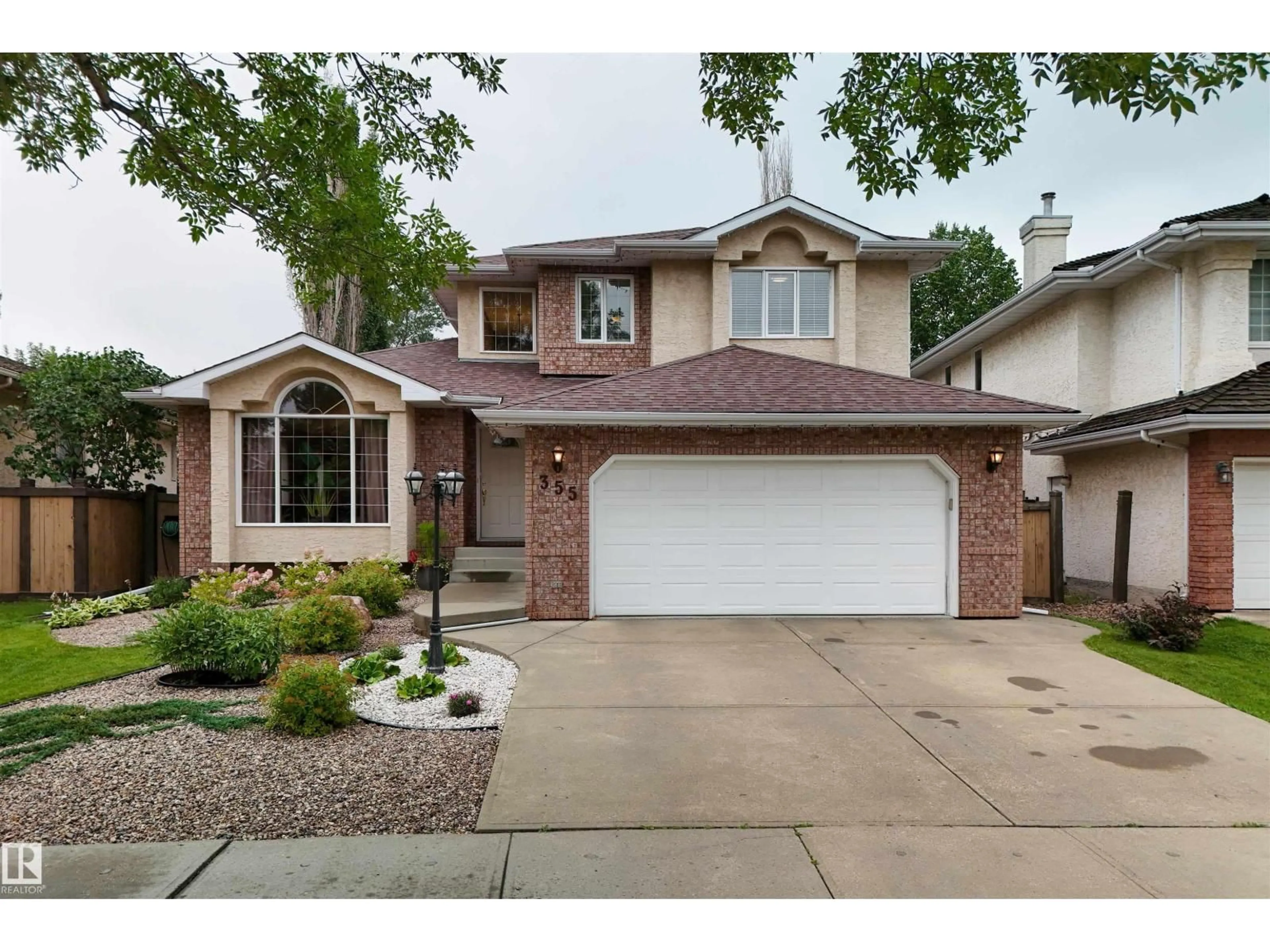 Home with brick exterior material, street for 355 BURTON RD, Edmonton Alberta T6R2J1