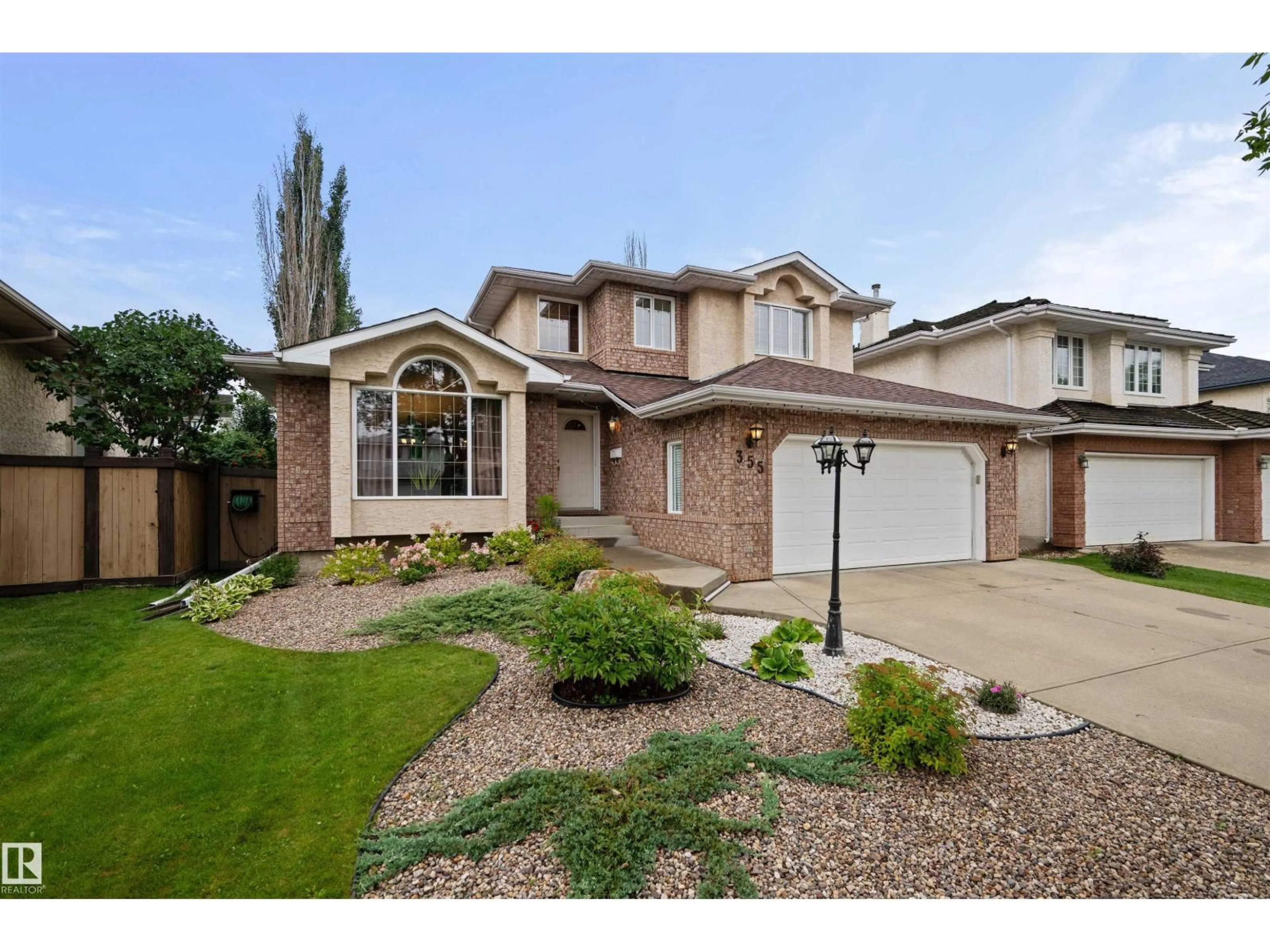 Home with brick exterior material, street for 355 BURTON RD, Edmonton Alberta T6R2J1