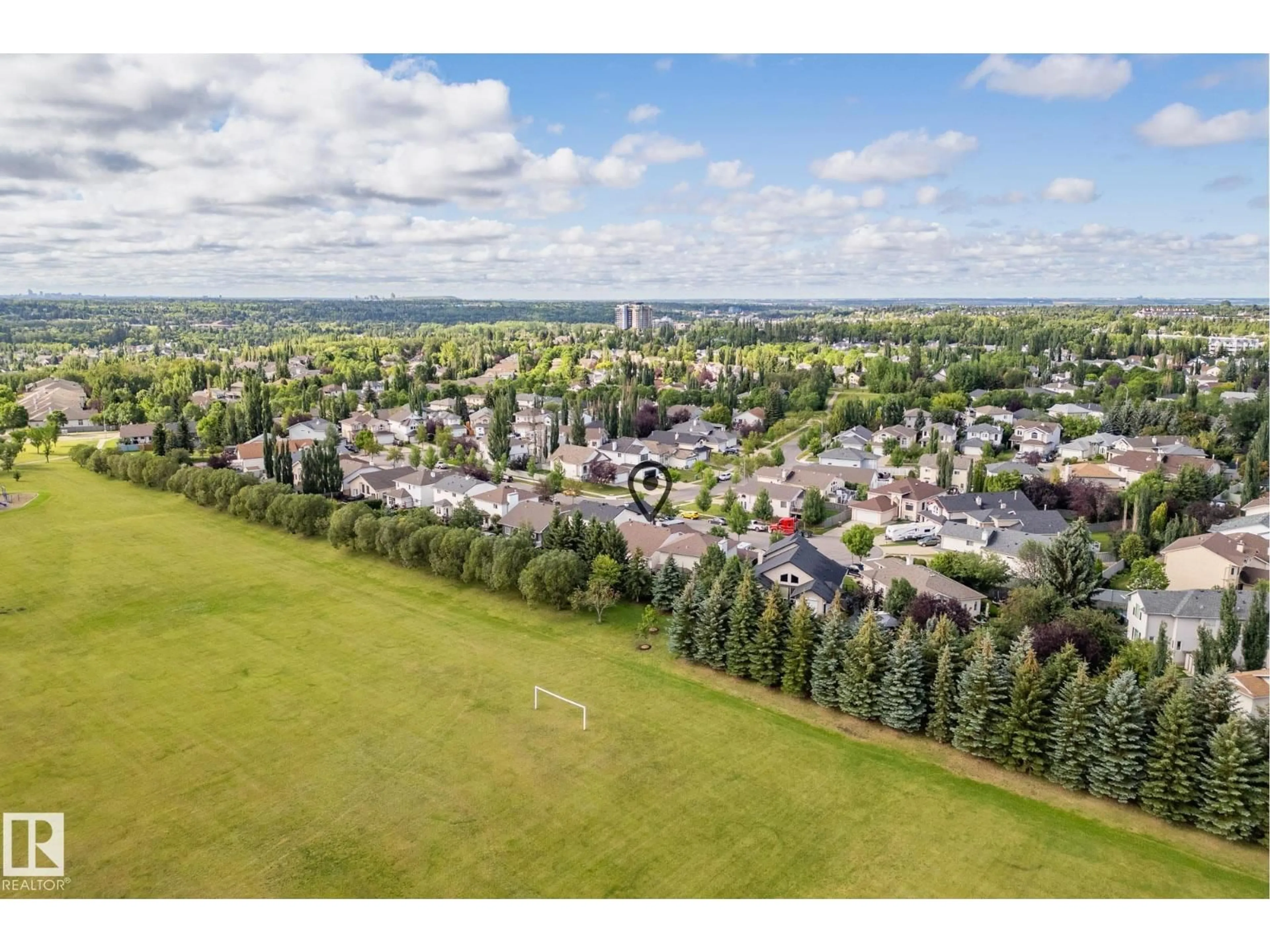 A pic from outside/outdoor area/front of a property/back of a property/a pic from drone, mountain view for 26 OSBORNE CL, St. Albert Alberta T8N6T1