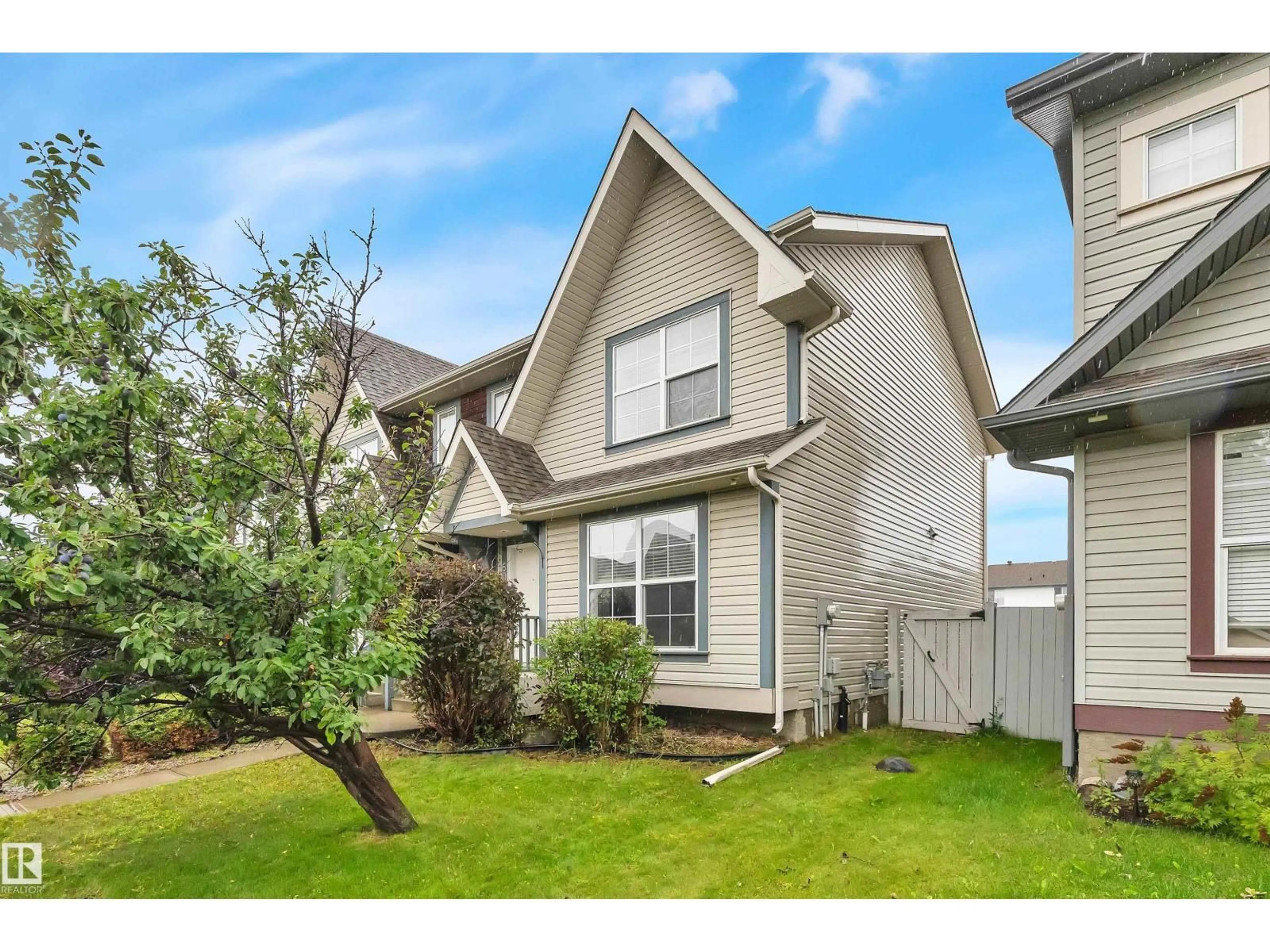 Home with vinyl exterior material, street for NW - 6014 213 ST, Edmonton Alberta T6M0H7