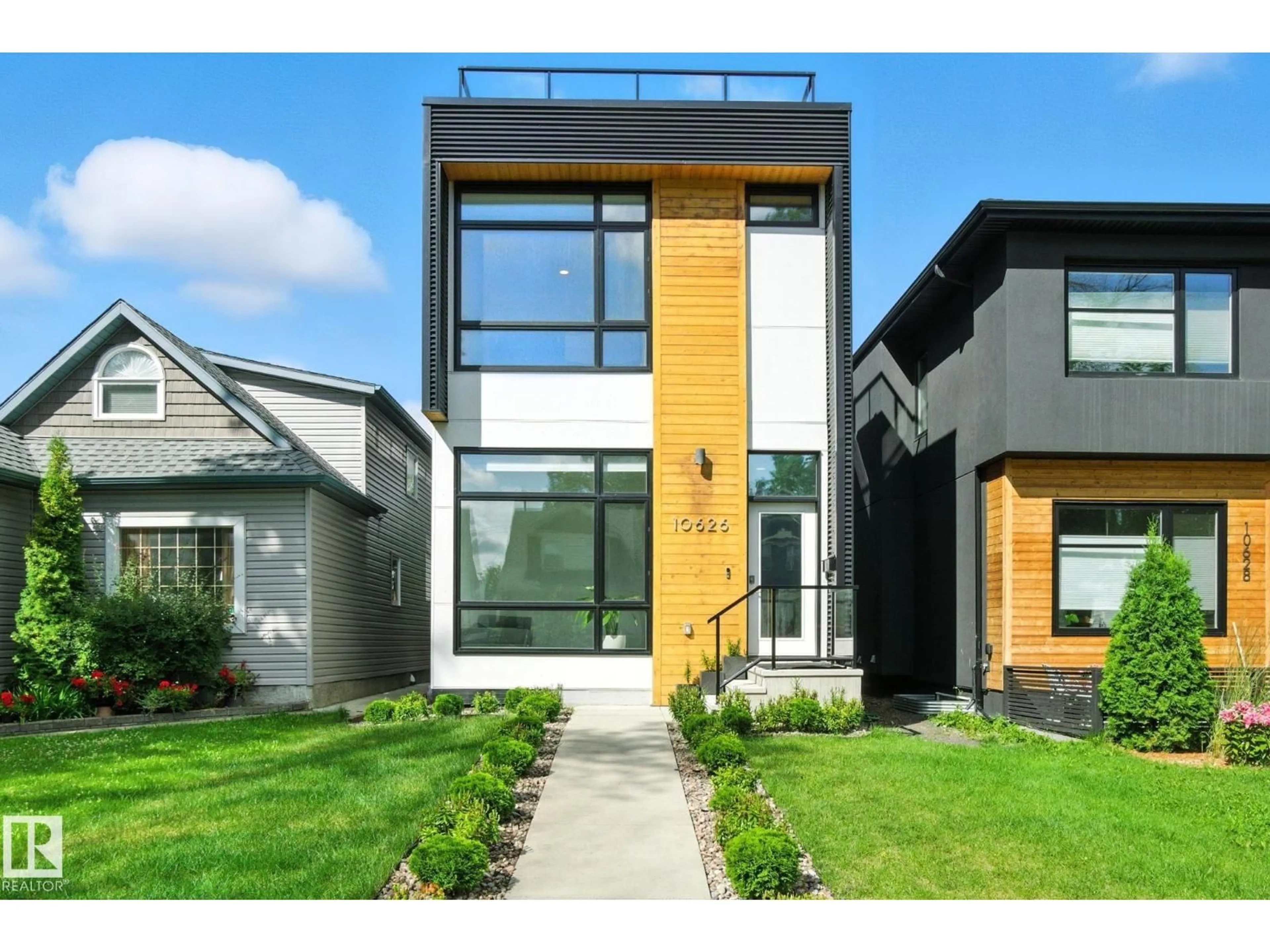 Home with brick exterior material, street for 10626 127 ST NW, Edmonton Alberta T5N1W1