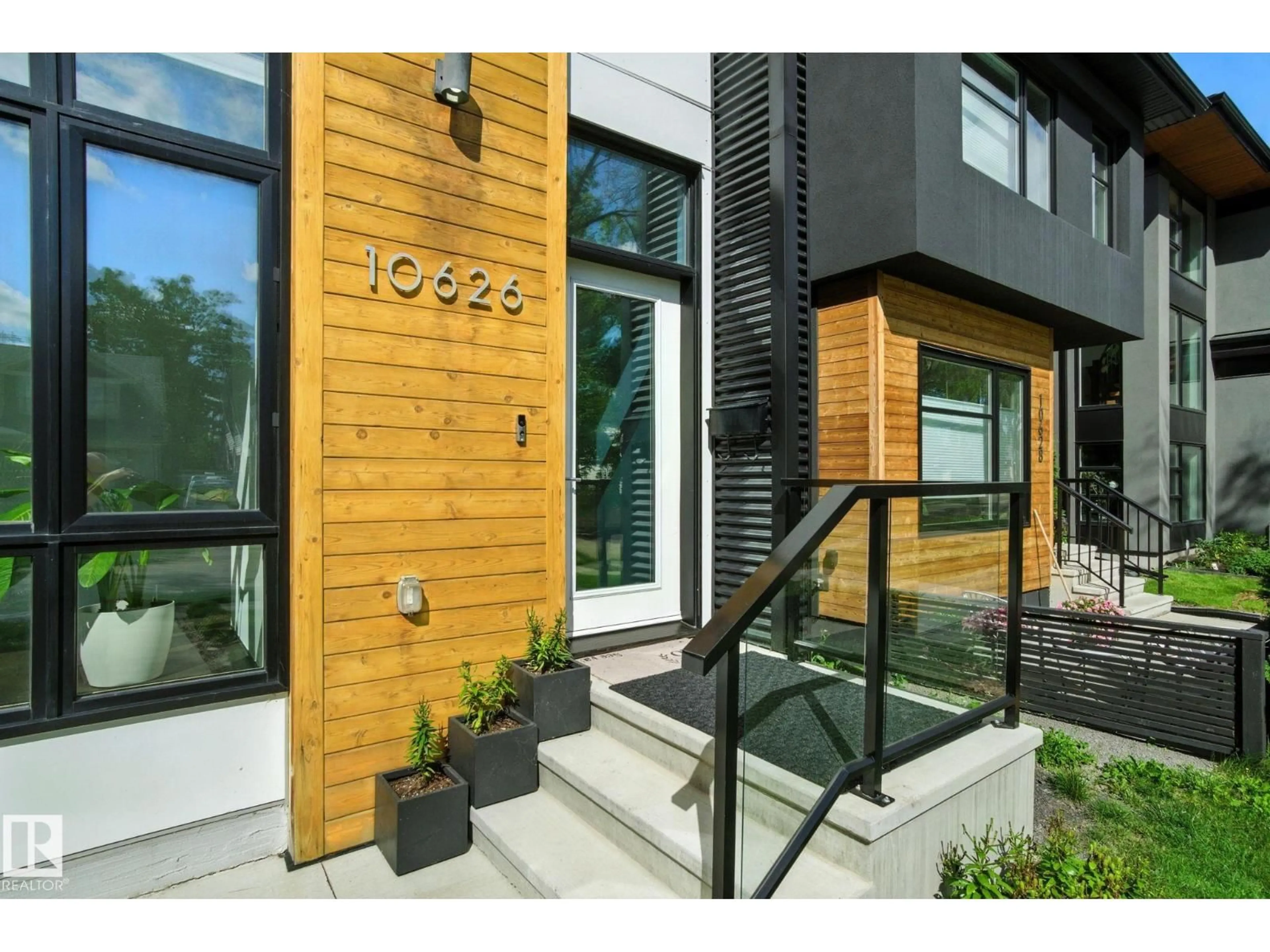 Home with brick exterior material, street for 10626 127 ST NW, Edmonton Alberta T5N1W1