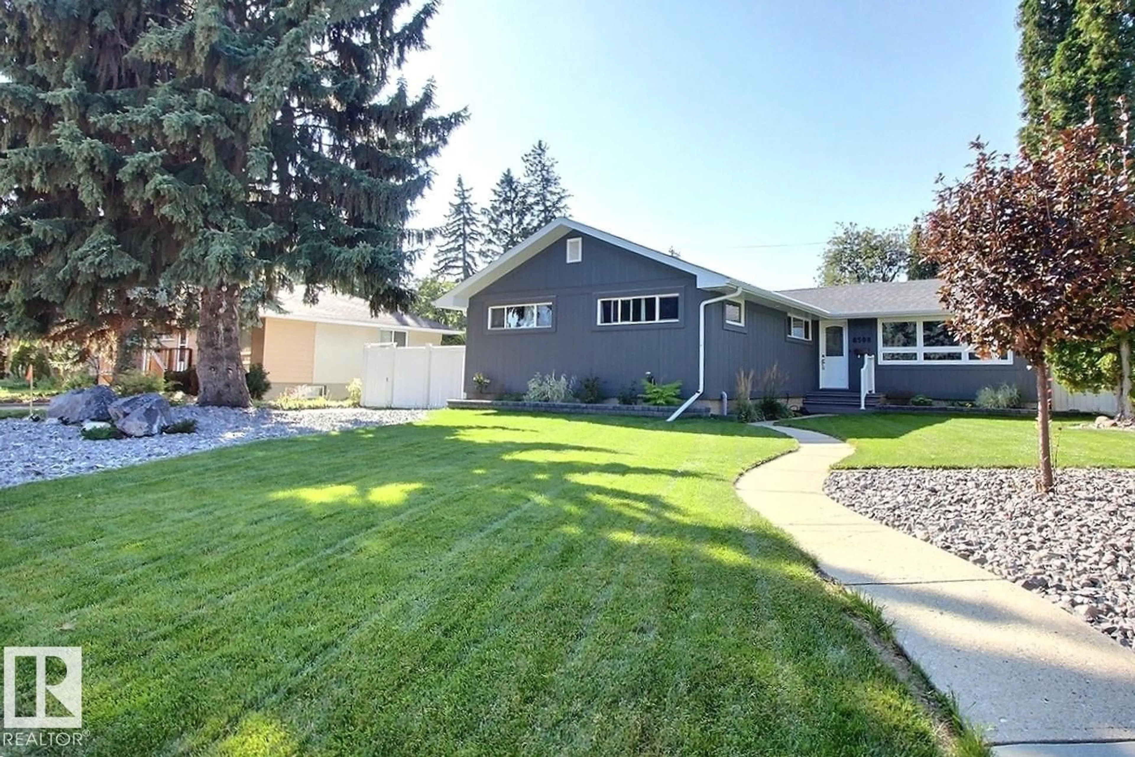 Home with vinyl exterior material, street for NW - 8508 148 ST, Edmonton Alberta T5R0Z6