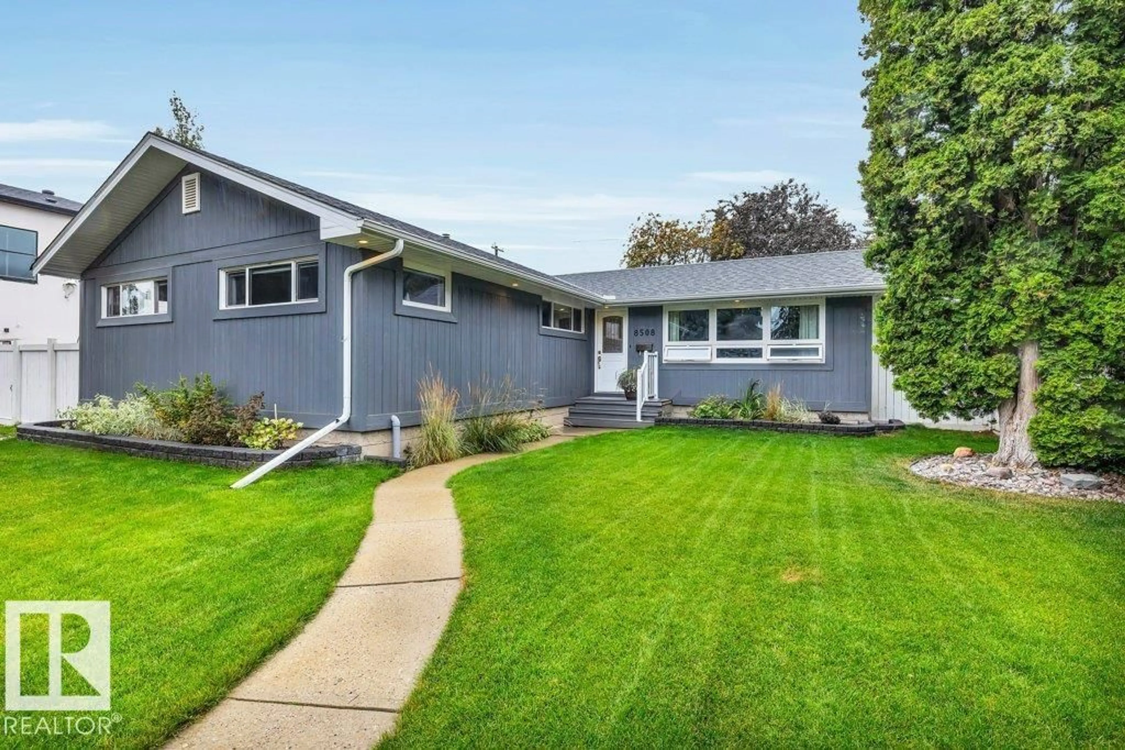 Home with vinyl exterior material, street for NW - 8508 148 ST, Edmonton Alberta T5R0Z6