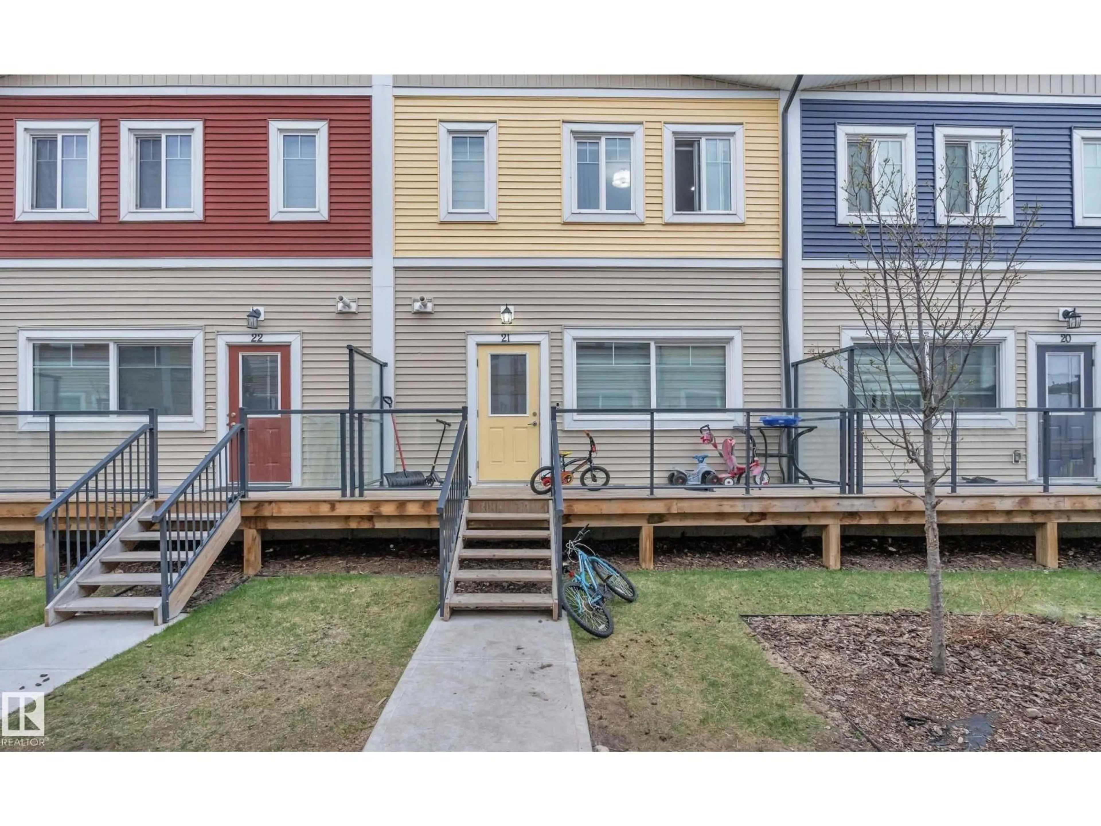Home with vinyl exterior material, street for 21 - 2803 14 AV, Edmonton Alberta T6T2K4