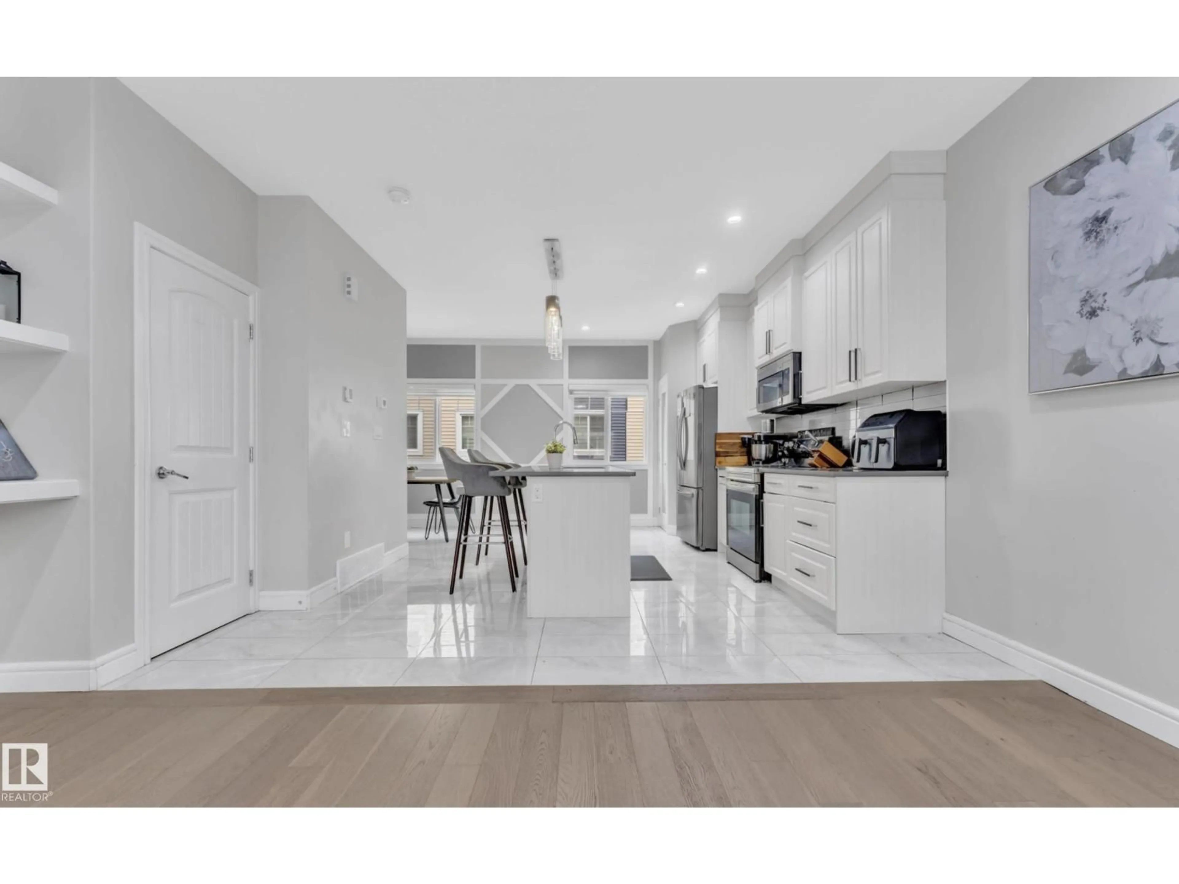 Open concept kitchen, ceramic/tile floor for 21 - 2803 14 AV, Edmonton Alberta T6T2K4
