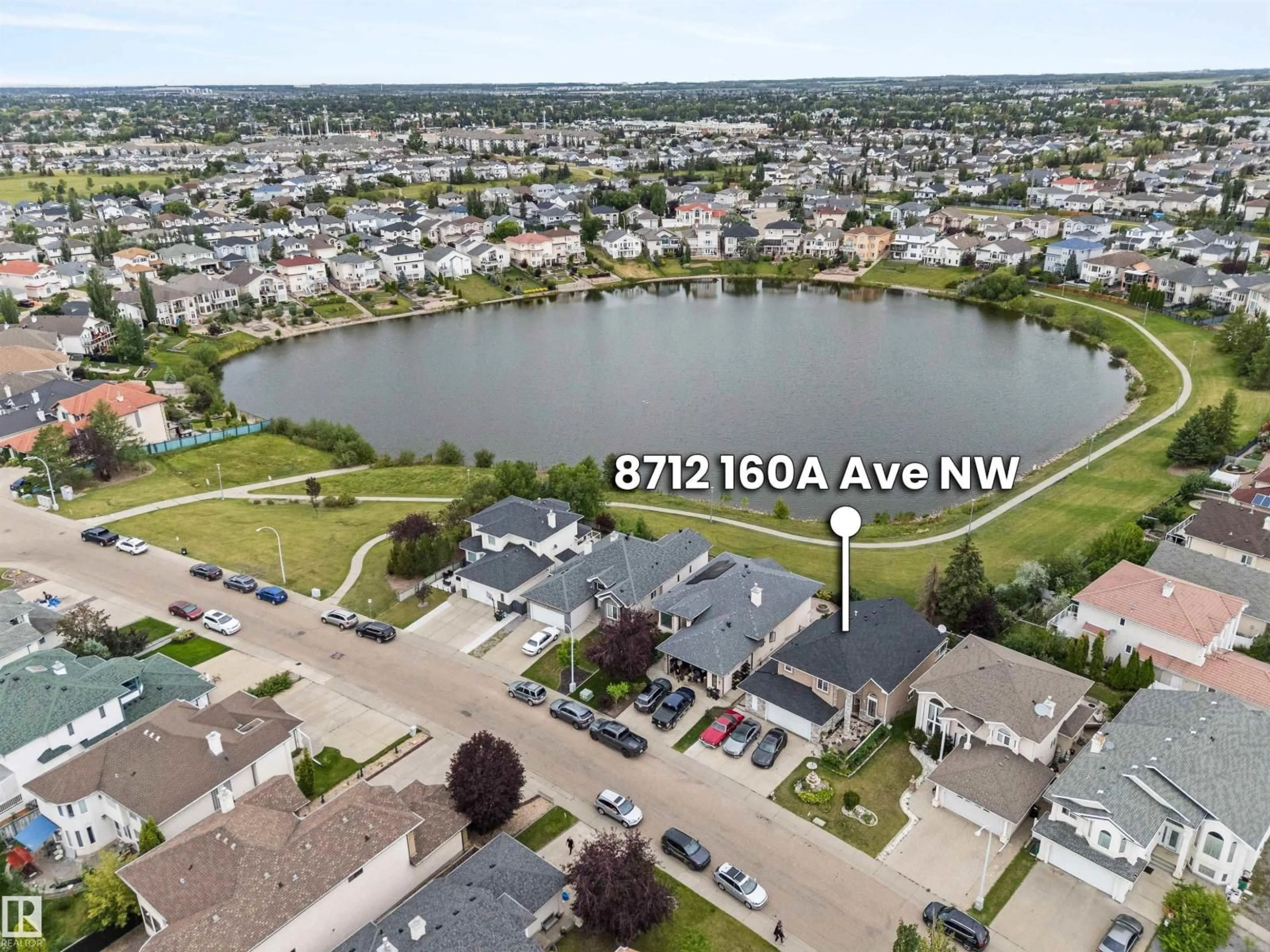 A pic from outside/outdoor area/front of a property/back of a property/a pic from drone, water/lake/river/ocean view for 8712 160A AV, Edmonton Alberta T5Z3K4
