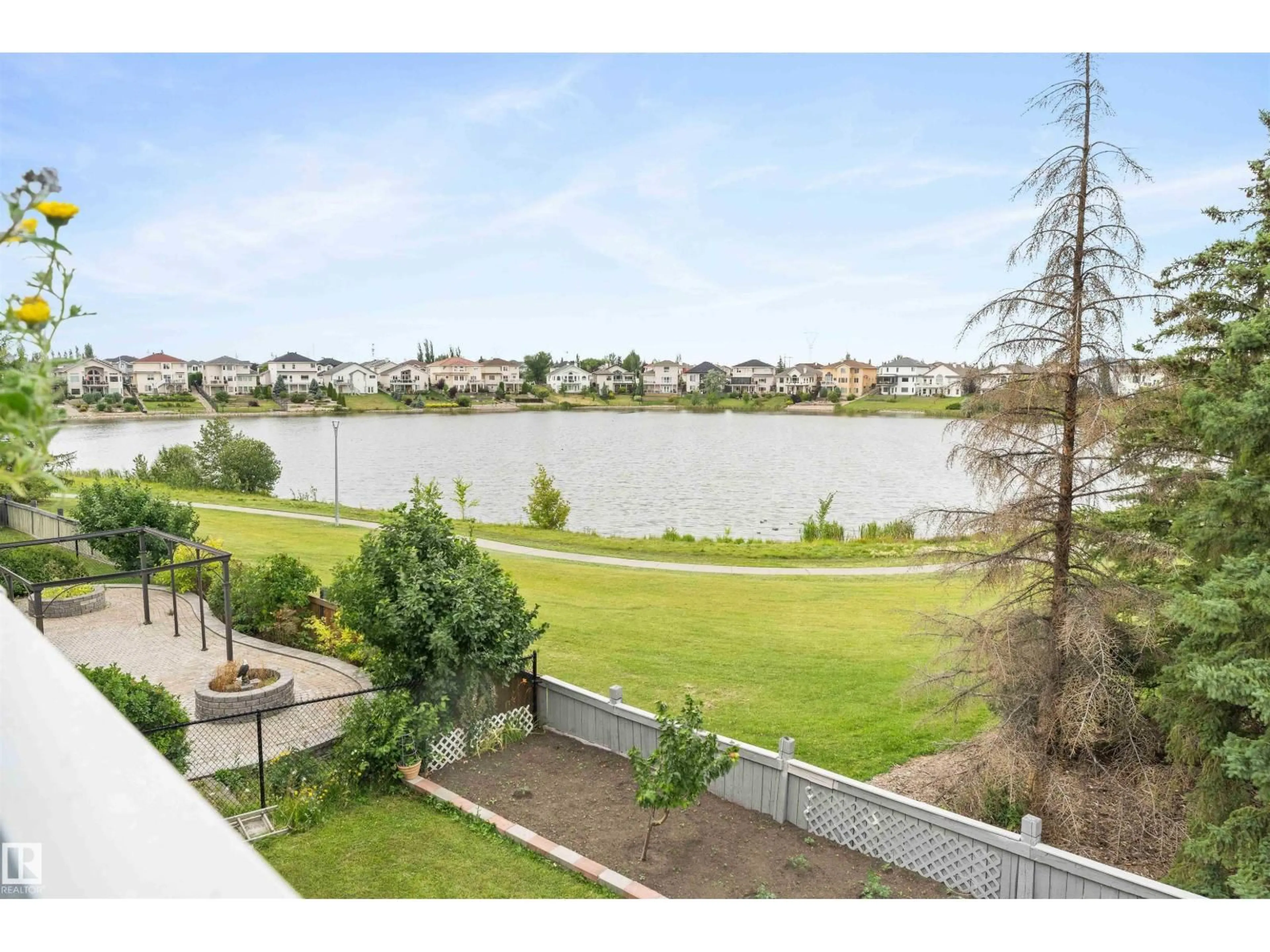 A pic from outside/outdoor area/front of a property/back of a property/a pic from drone, water/lake/river/ocean view for 8712 160A AV, Edmonton Alberta T5Z3K4