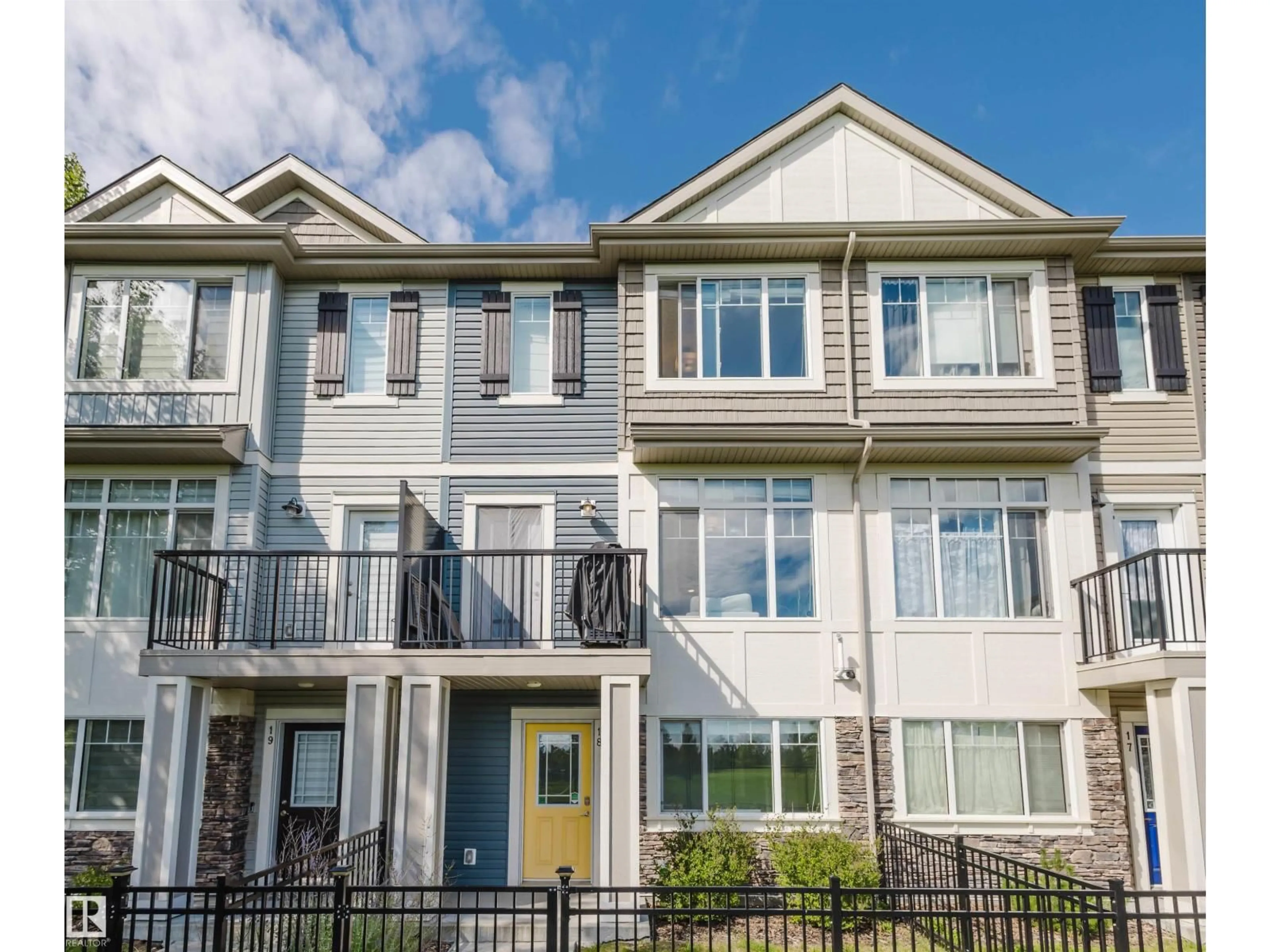 Home with vinyl exterior material, street for NW - #18 11373 12 AV, Edmonton Alberta T6J5V2