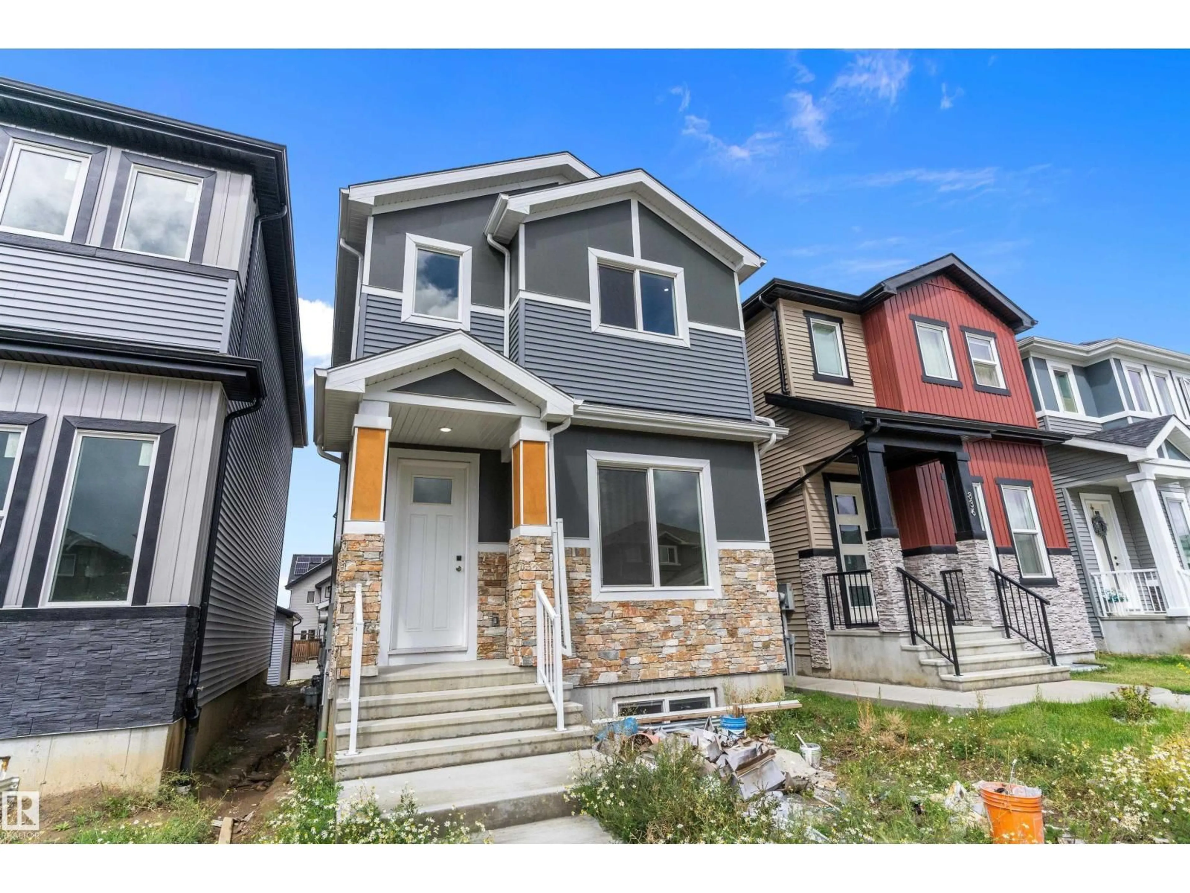Home with vinyl exterior material, street for 838 NORTHERN HARRIER LN, Edmonton Alberta T5R2V5