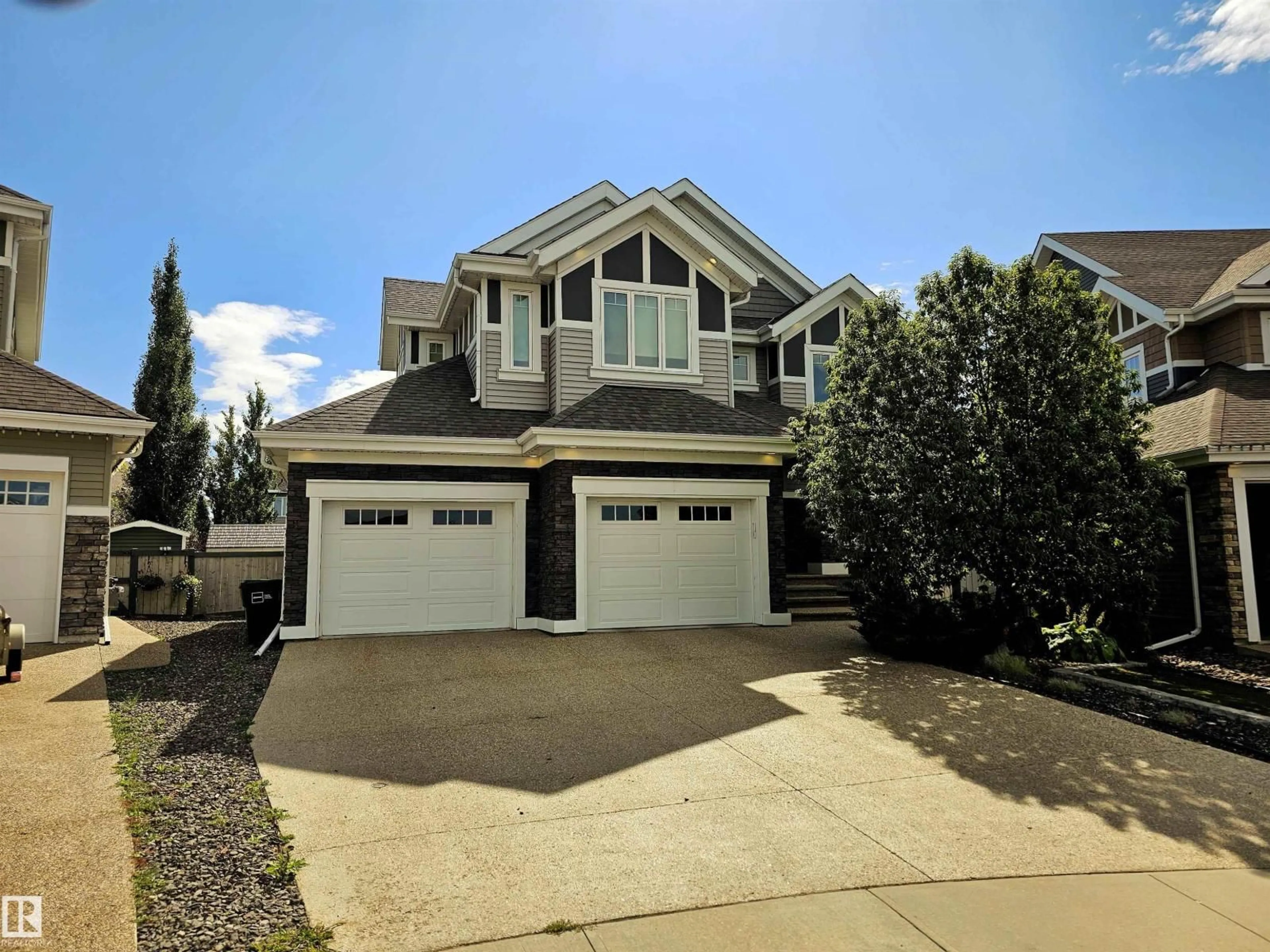 Home with vinyl exterior material, street for SW - 8829 19 AV, Edmonton Alberta T5Z3K4