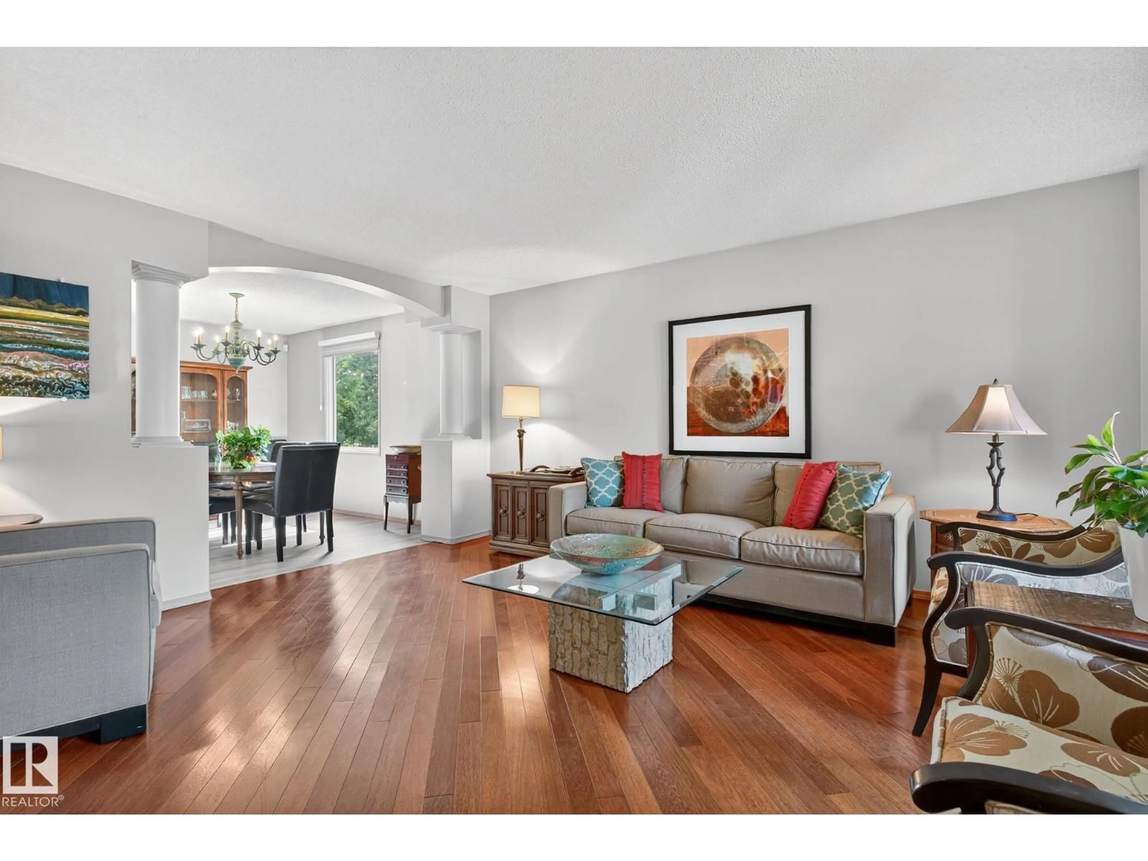 Living room with furniture, wood/laminate floor for 14708 58 AV, Edmonton Alberta T6H4T2