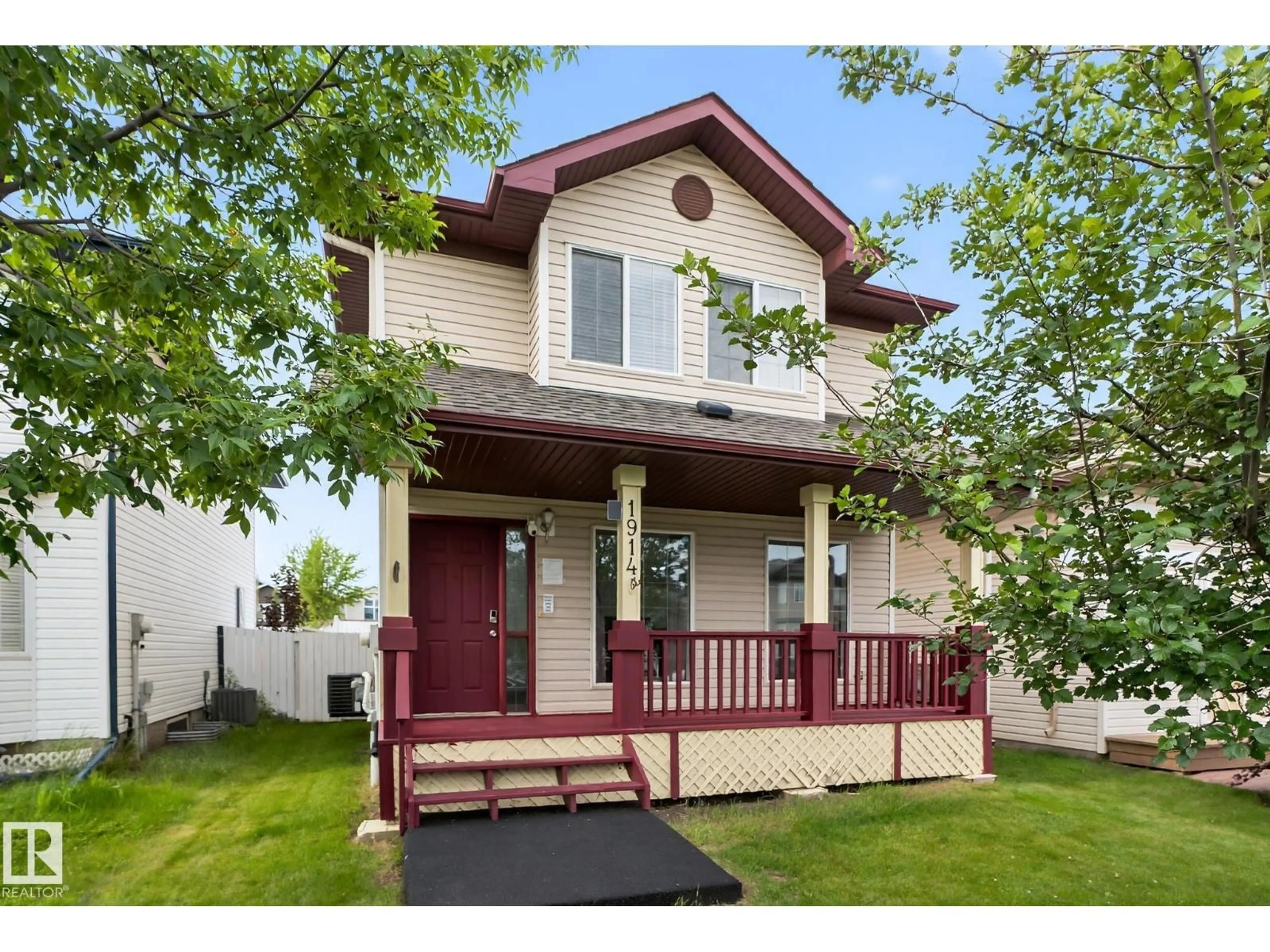 Home with vinyl exterior material, street for 1914 37 AVE, Edmonton Alberta T6T1S7