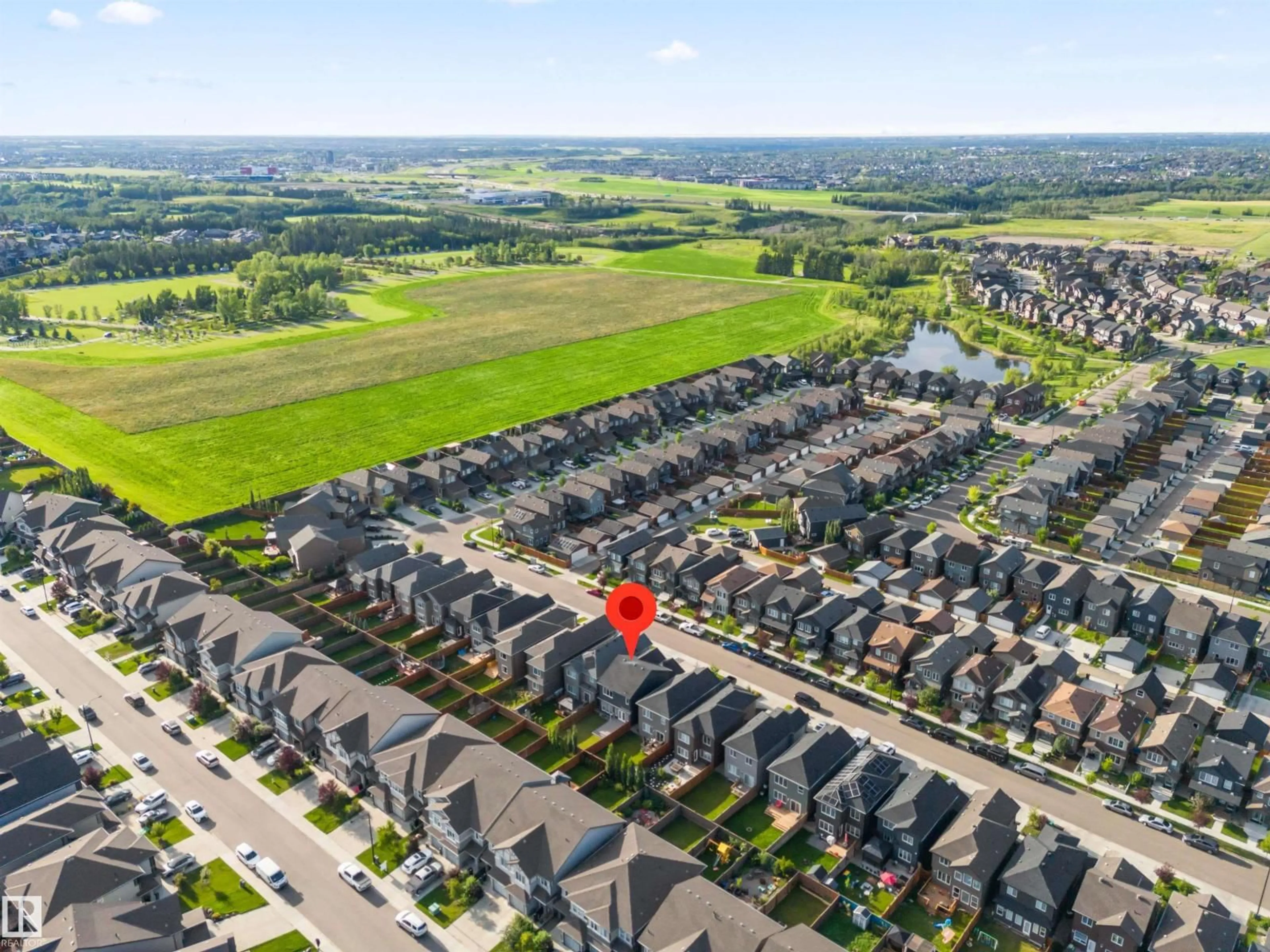 A pic from outside/outdoor area/front of a property/back of a property/a pic from drone, street for SW SW - 2100 GRAYDON HILL CR, Edmonton Alberta T6W4K6