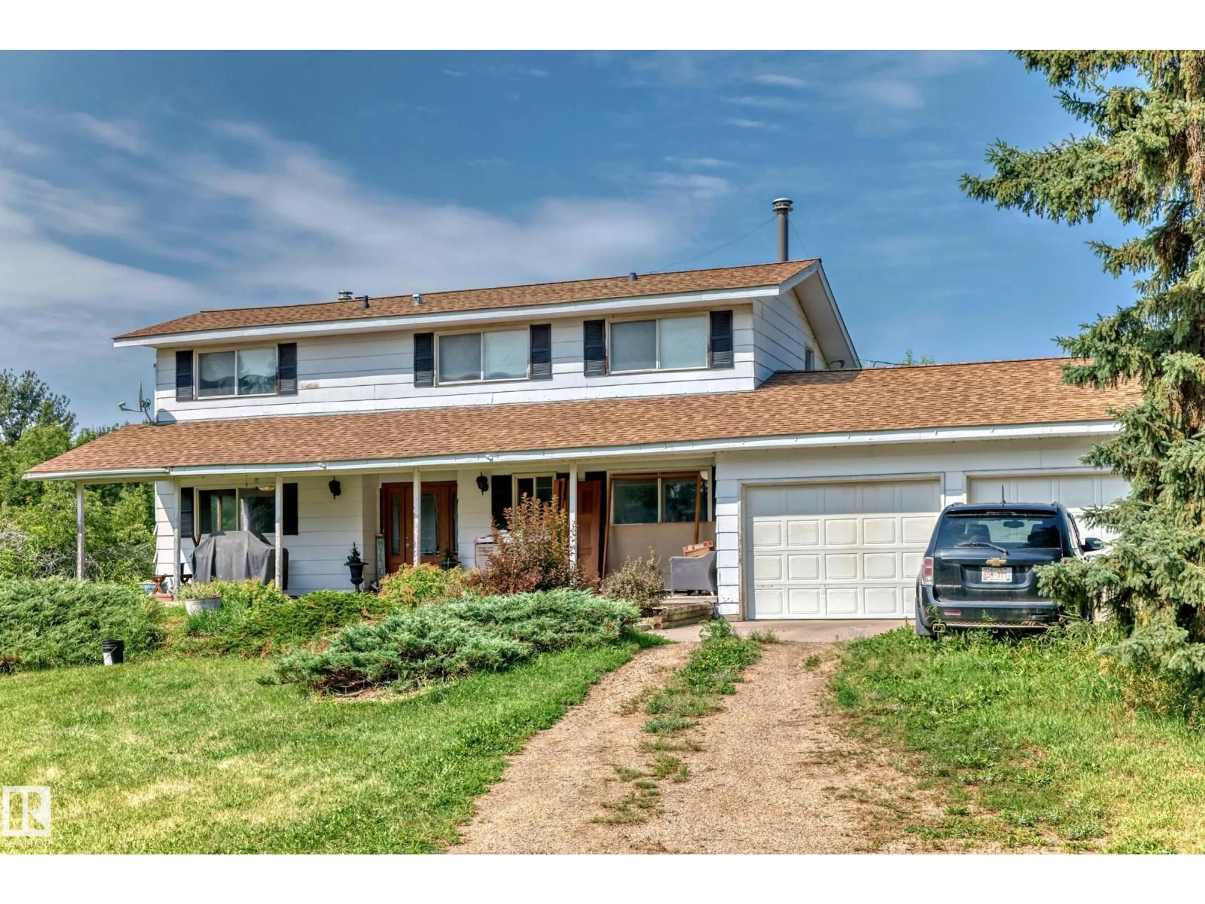 Home with vinyl exterior material, street for 50256 RGE RD 11, Rural Leduc County Alberta T0C2P0