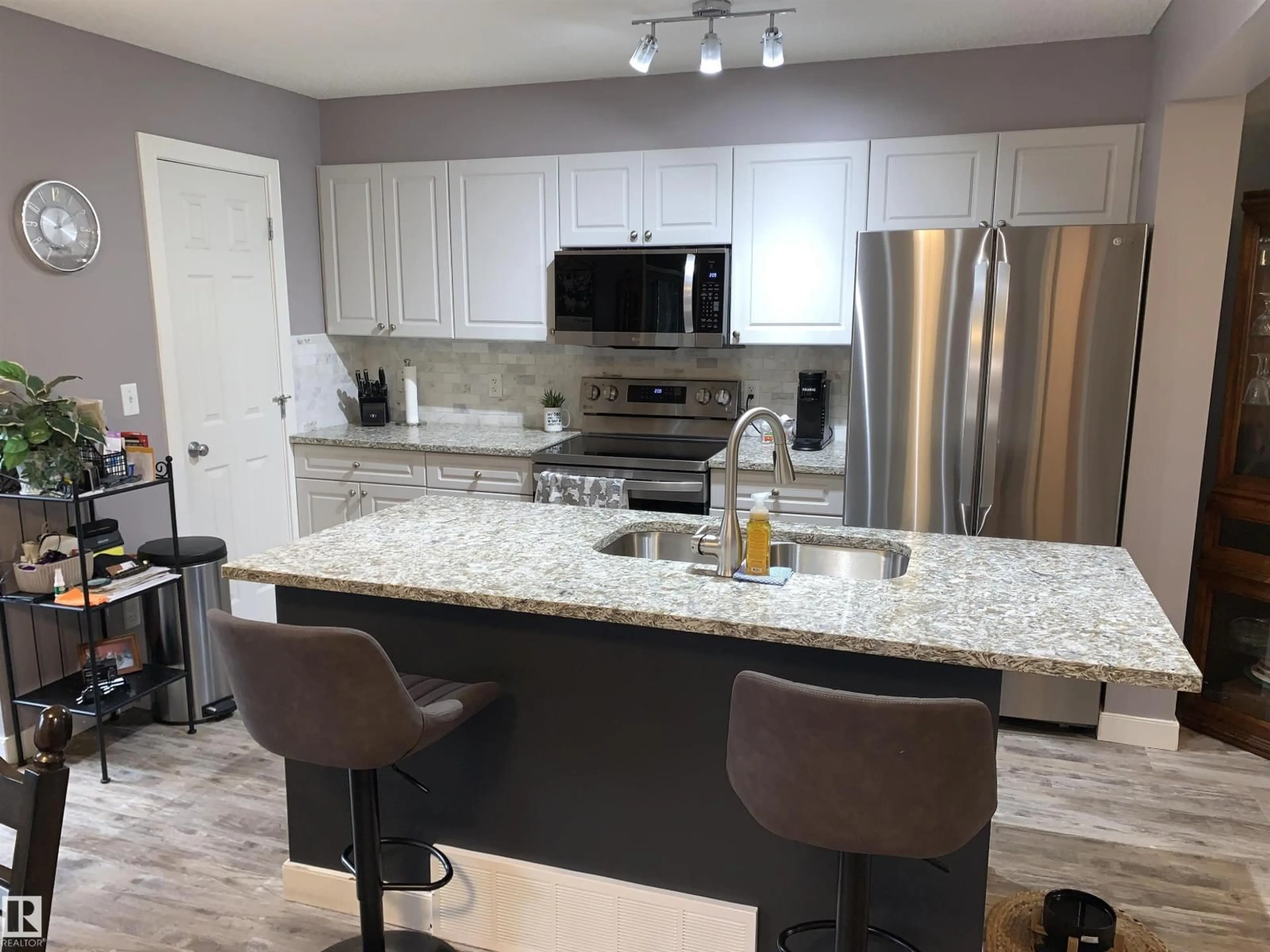 Open concept kitchen, ceramic/tile floor for 3818 ALLAN DR, Edmonton Alberta T6W0S7
