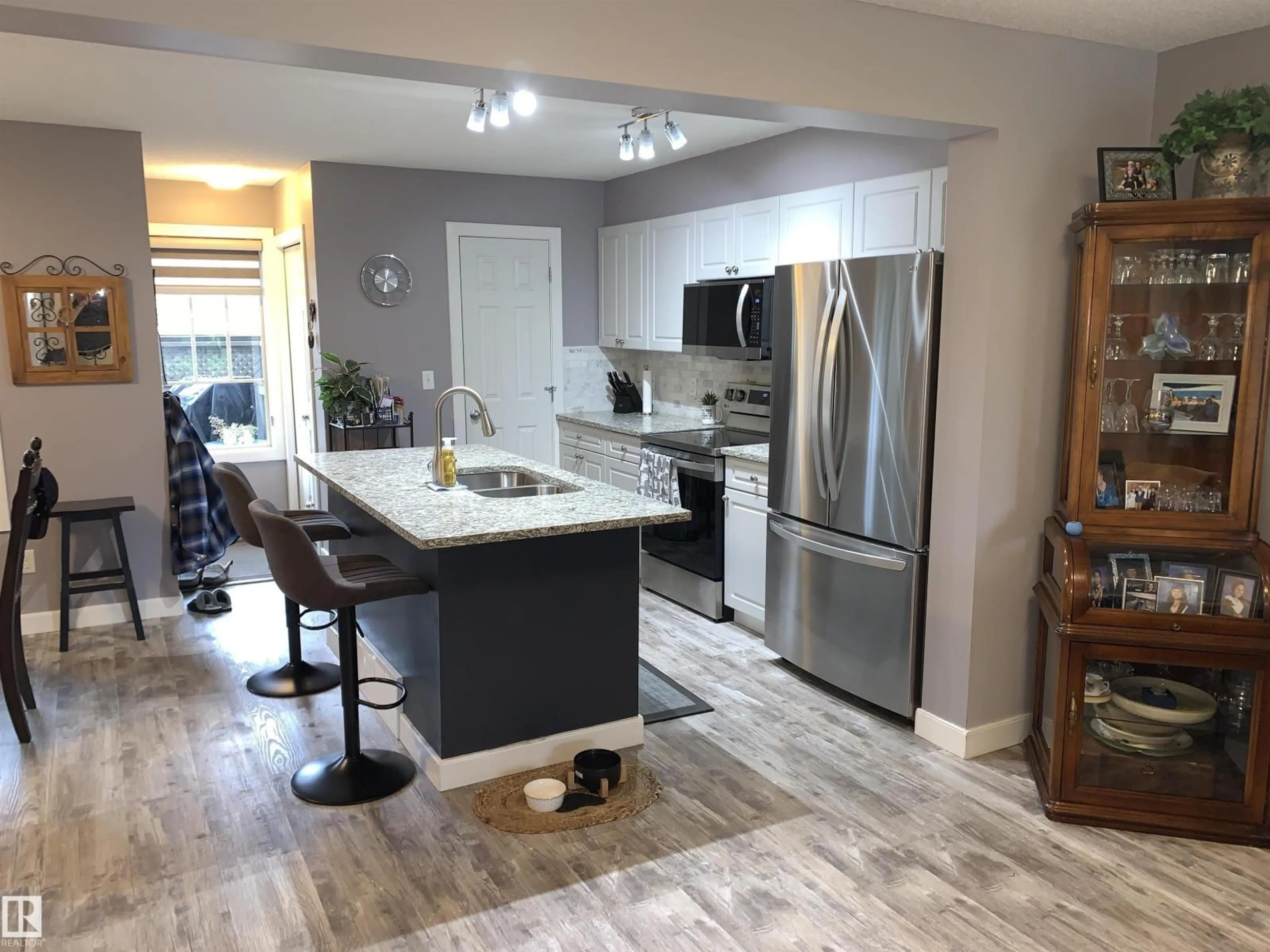 Open concept kitchen, ceramic/tile floor for 3818 ALLAN DR, Edmonton Alberta T6W0S7