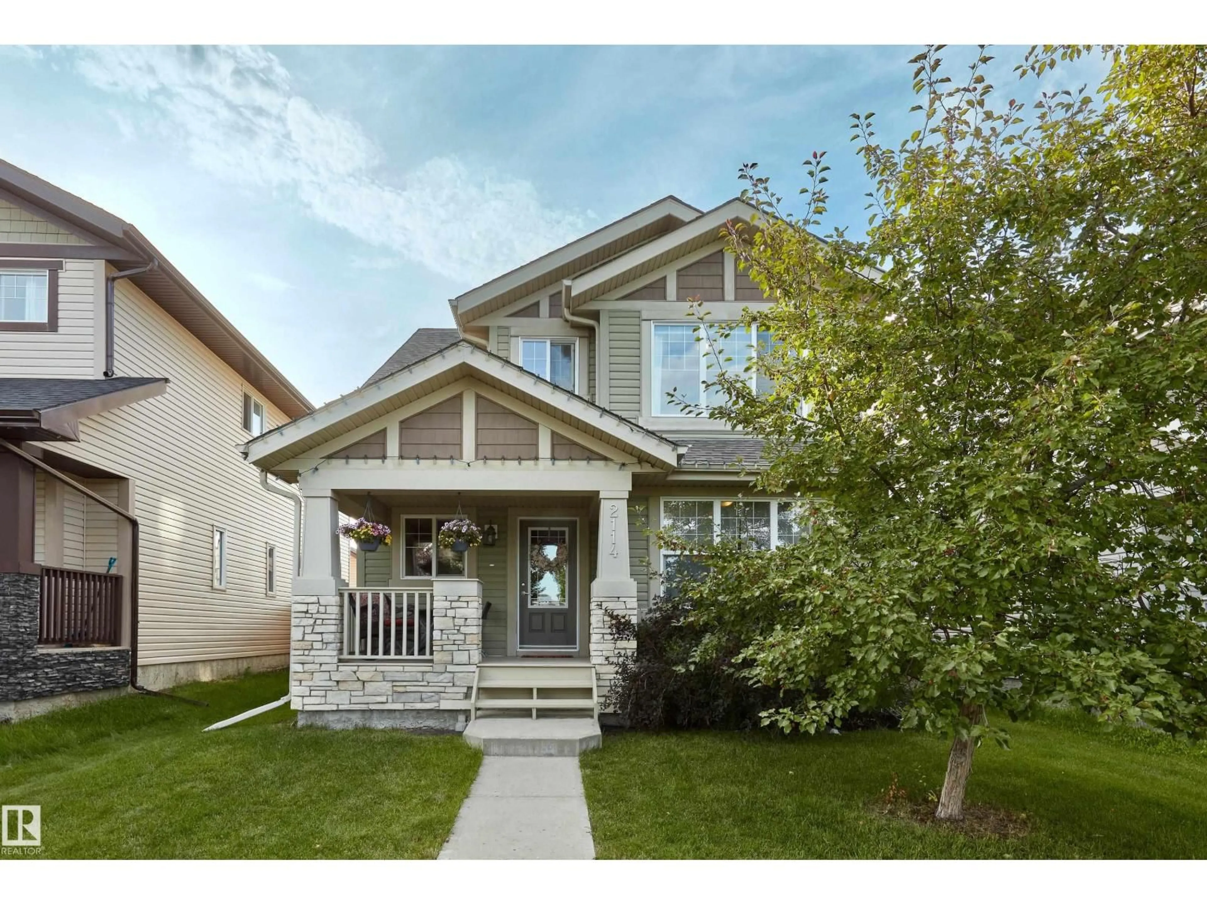 Home with vinyl exterior material, street for 2114 GLENRIDDING WAY, Edmonton Alberta T6W2H4