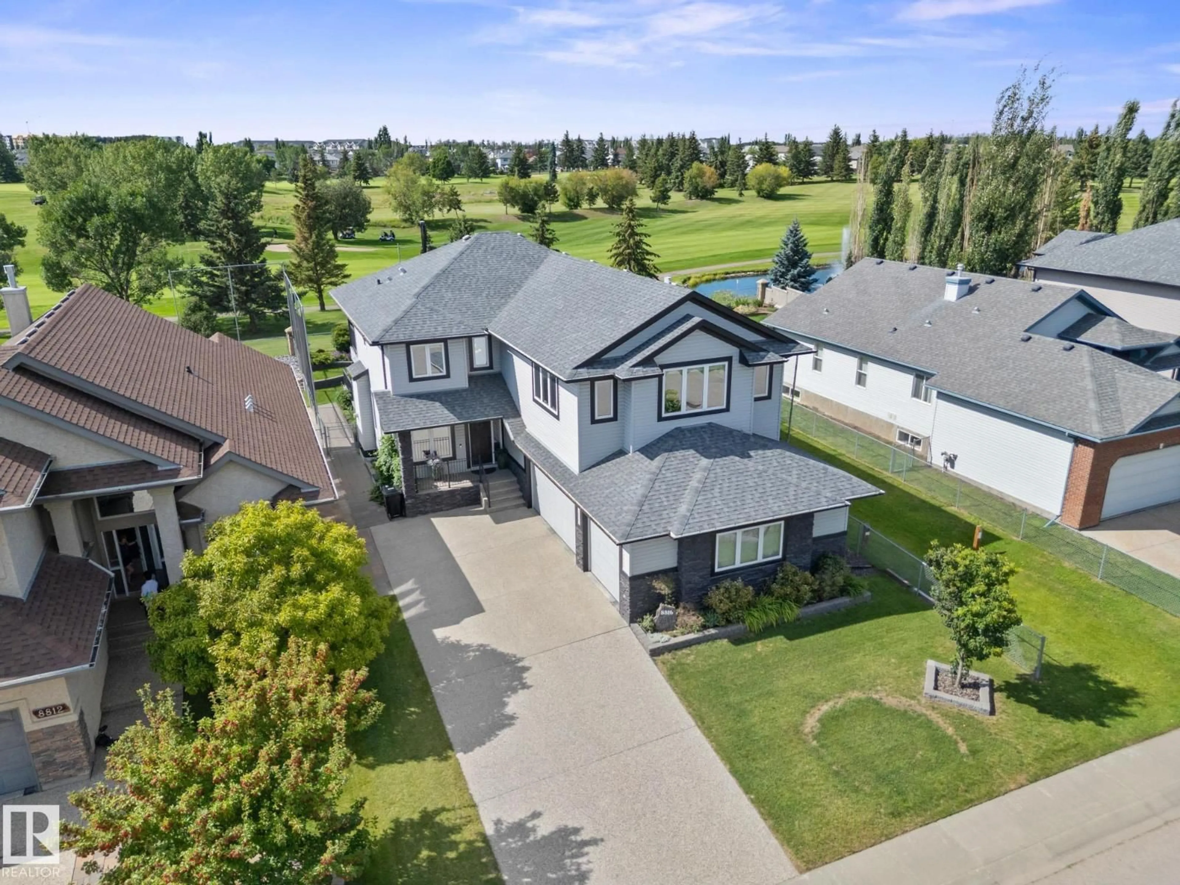 A pic from outside/outdoor area/front of a property/back of a property/a pic from drone, street for 8816 208 ST, Edmonton Alberta T5T6Y3